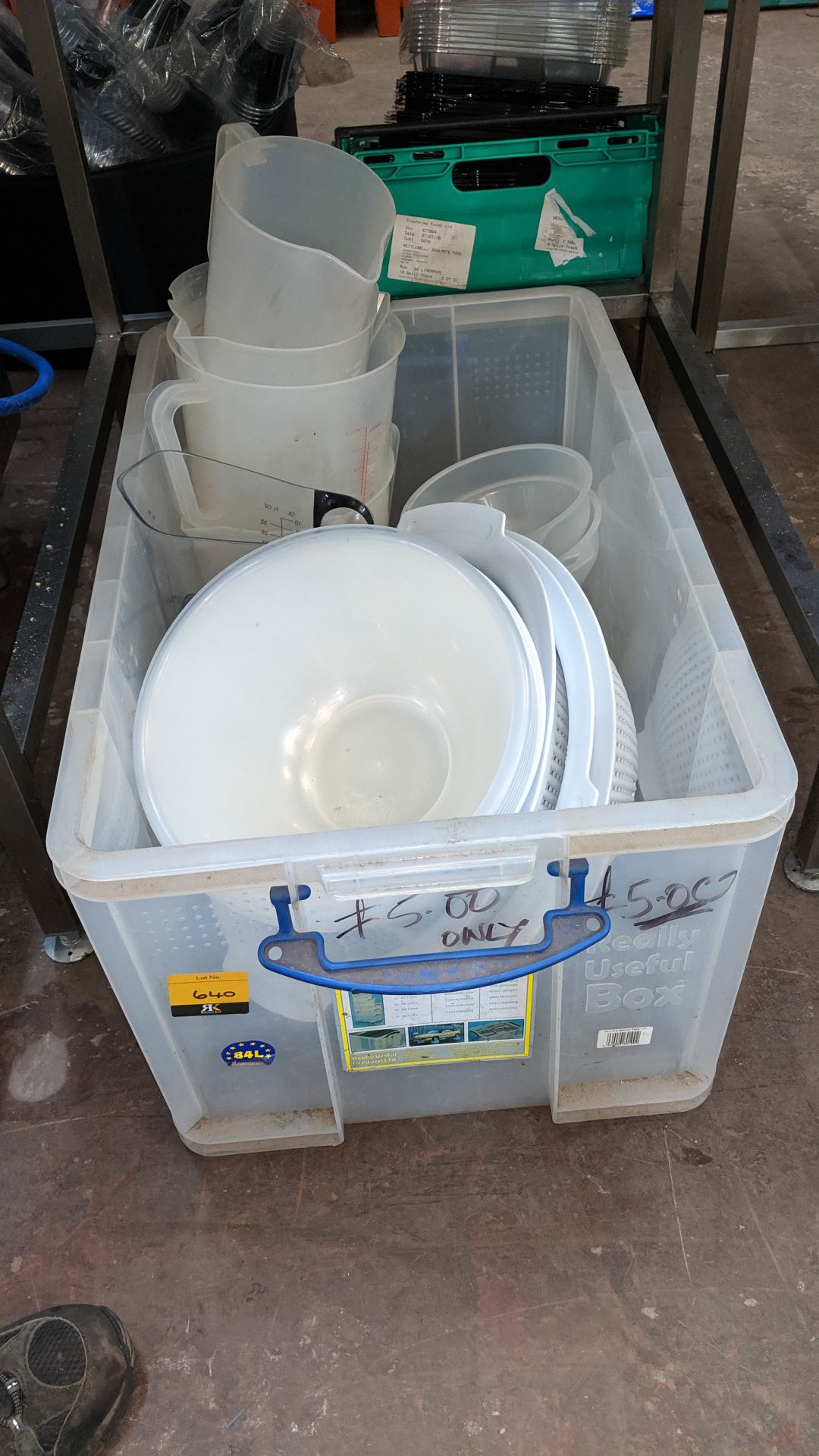 The contents of a crate of assorted large plastic bowls, jugs, funnels & more - crate excluded