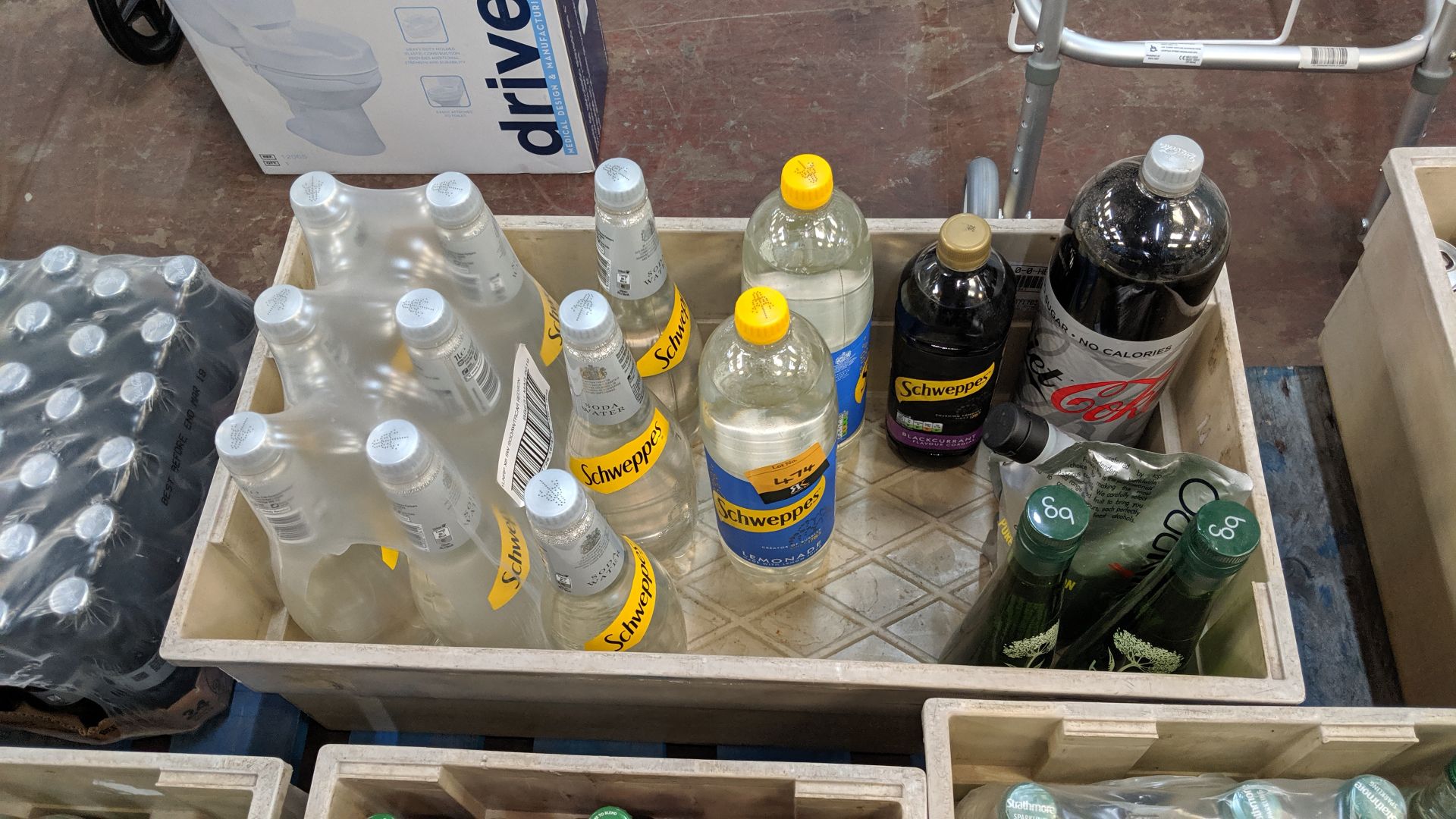 The contents of a crate of large bottles & pouches of assorted soft drinks, comprising 9 bottles