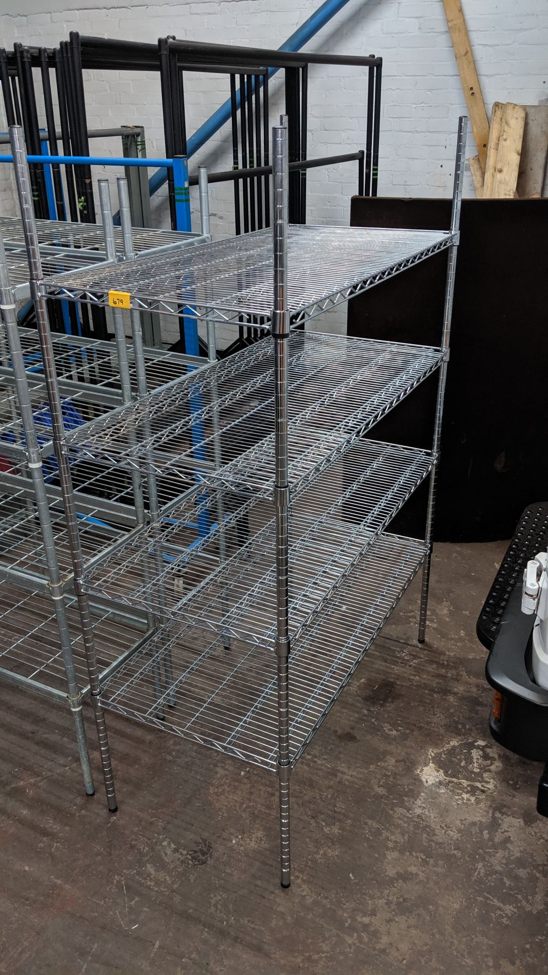 Large freestanding bay of chrome racking IMPORTANT: Please remember goods successfully bid upon must