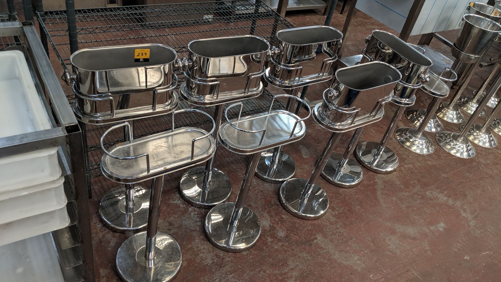 8 off double width wine/champagne bottle stands plus 5 buckets for use with same IMPORTANT: Please