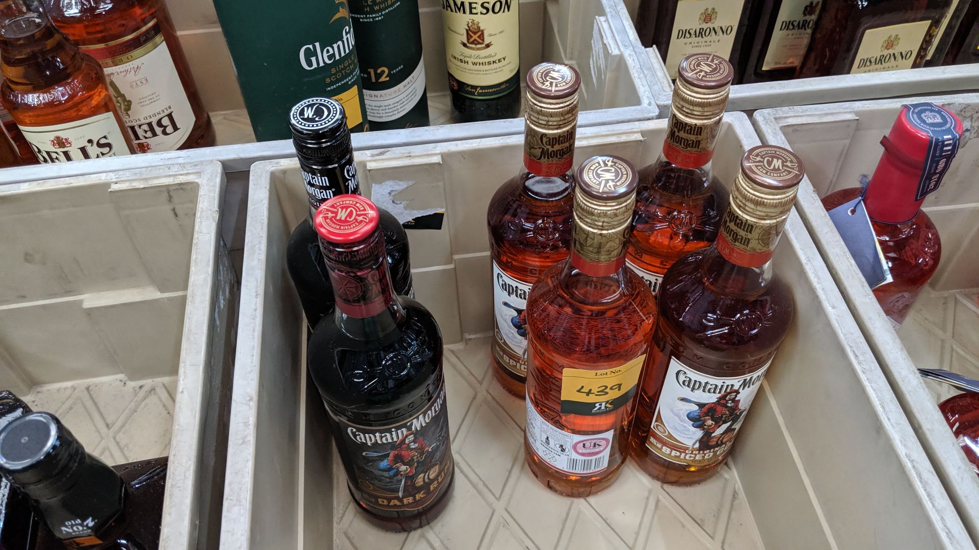 Captain Morgan rum lot comprising 1 off 70cl bottle of dark rum, 1 off 70cl bottle of original rum &