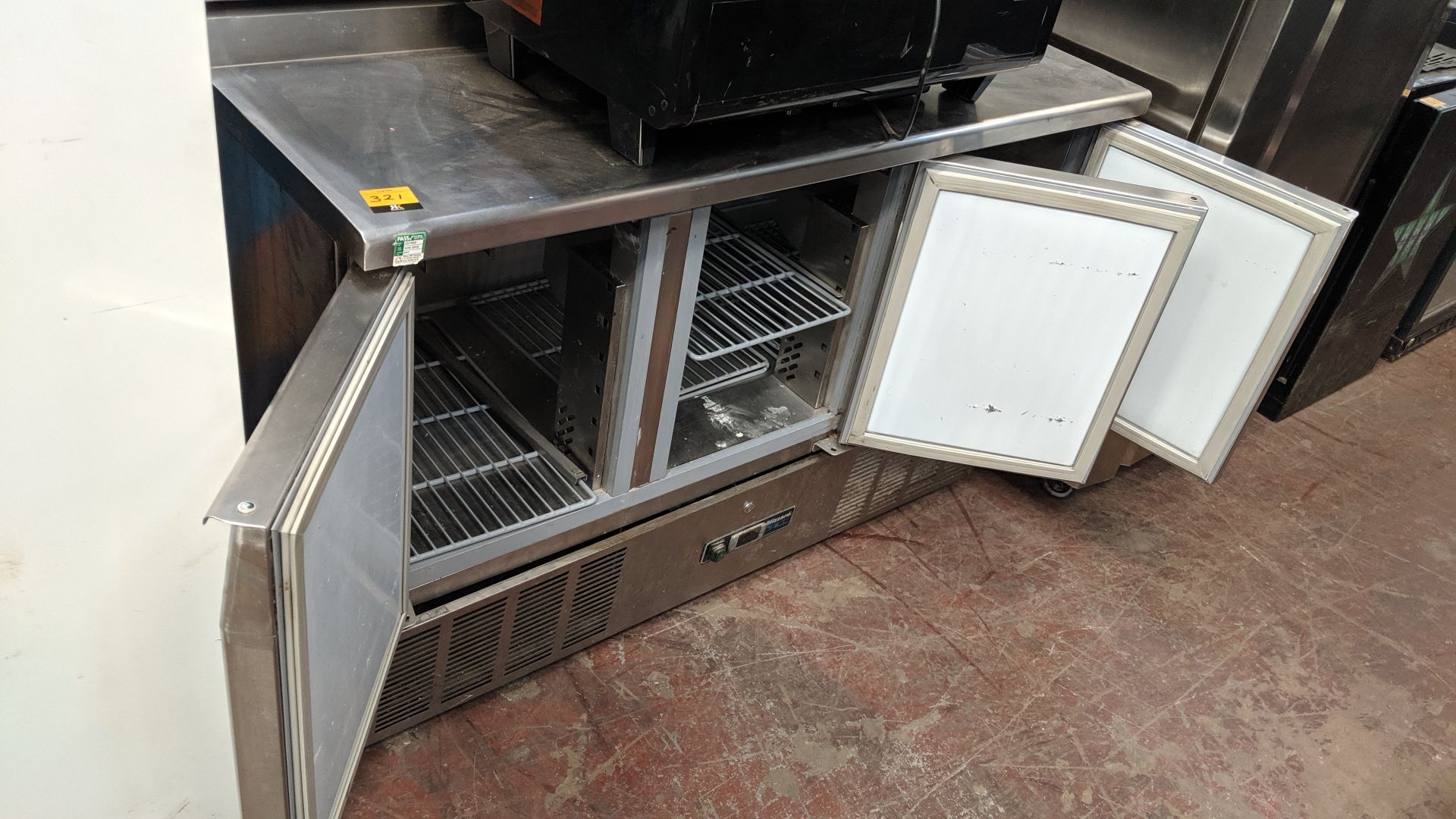 Blizzard stainless steel triple door refrigerated prep unit with salad dispenser above IMPORTANT: - Image 3 of 5