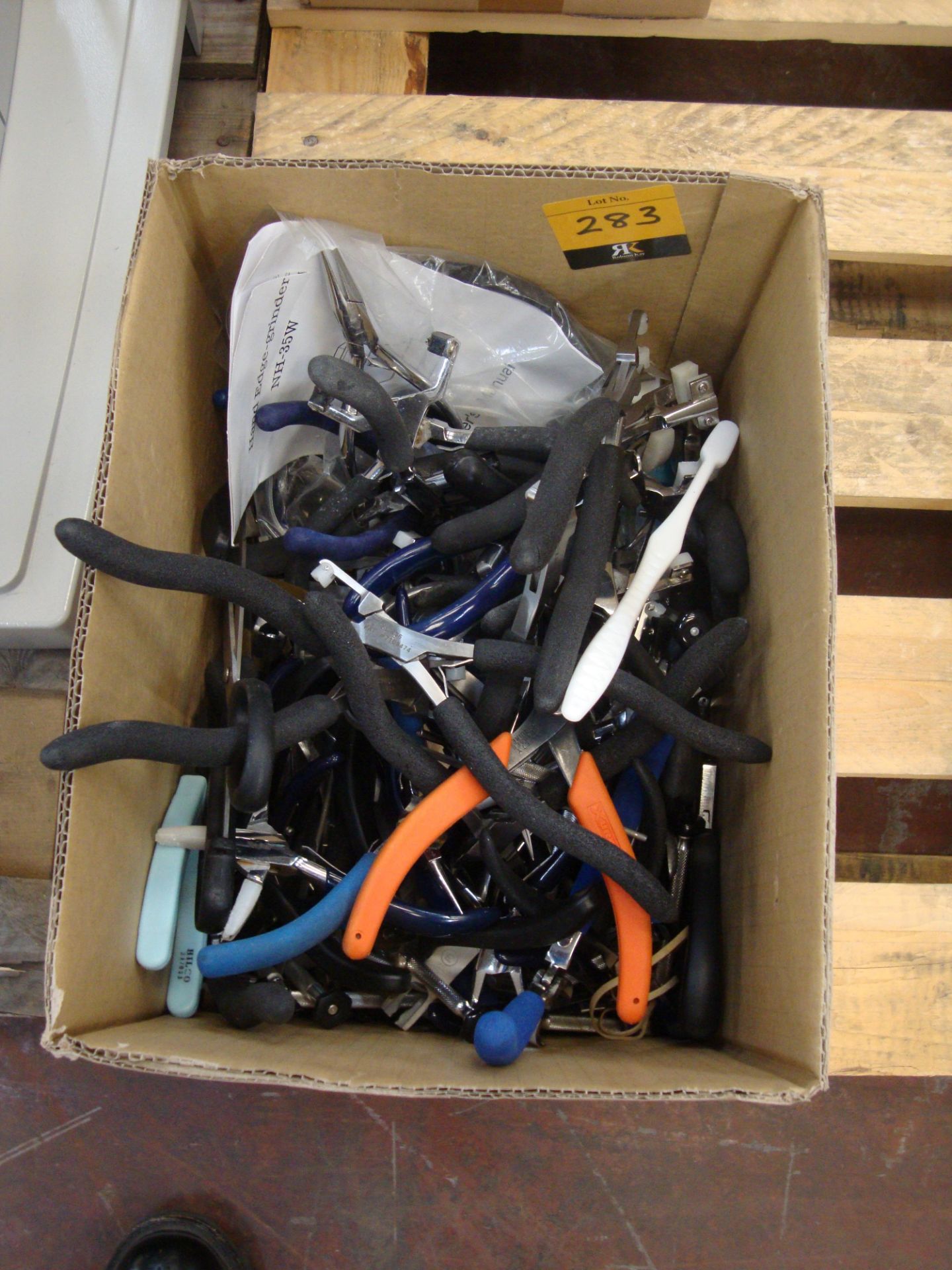 Box of pliers and other hand tools All the lots in this auction are being sold on behalf of Galaxy