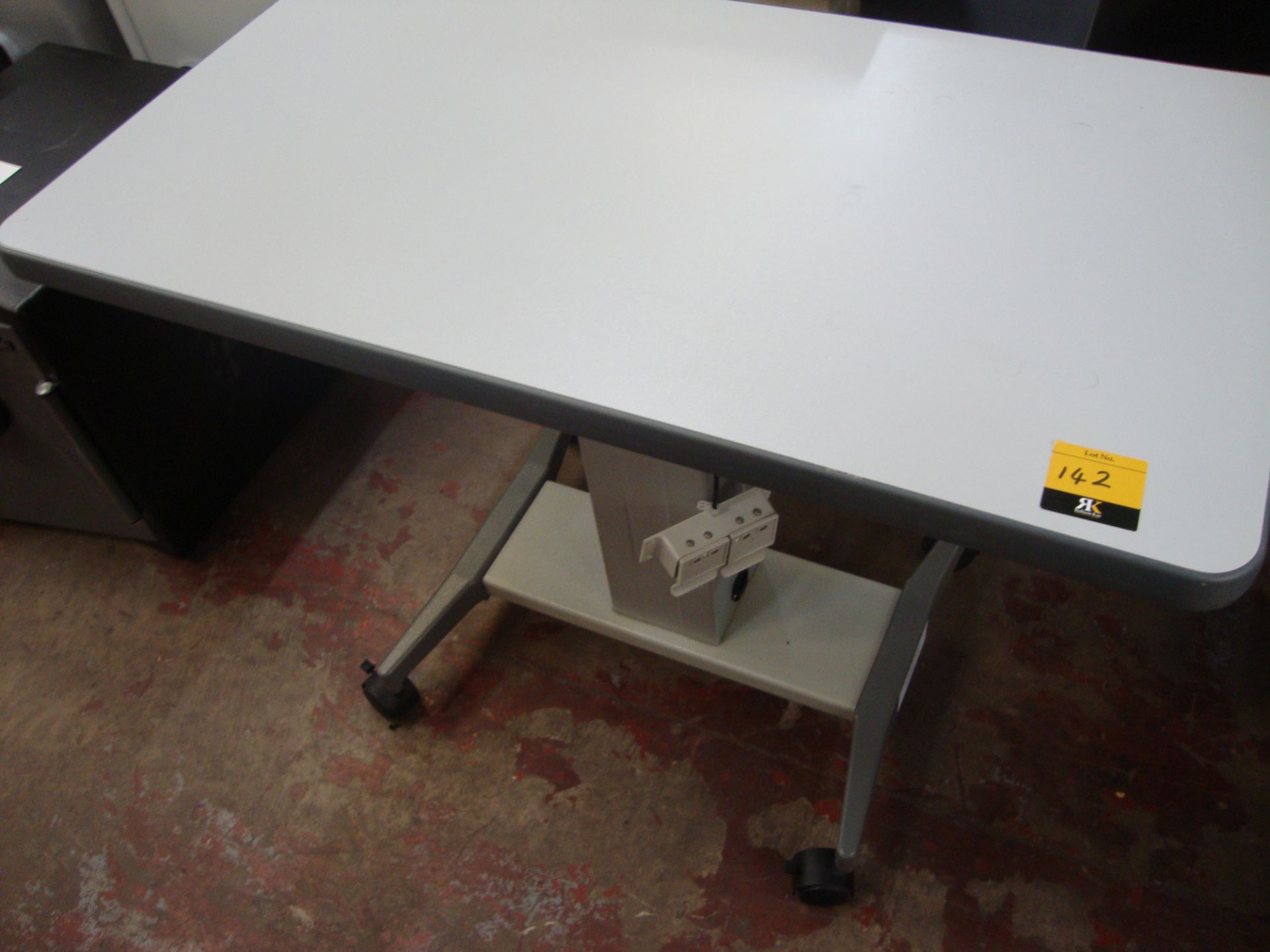 Electric motorized rising table 910mm x 490mm All the lots in this auction are being sold on