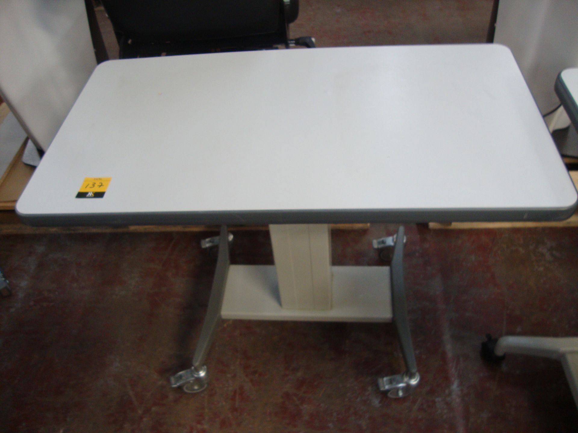 Electric motorized rising table 910mm x 490mm All the lots in this auction are being sold on