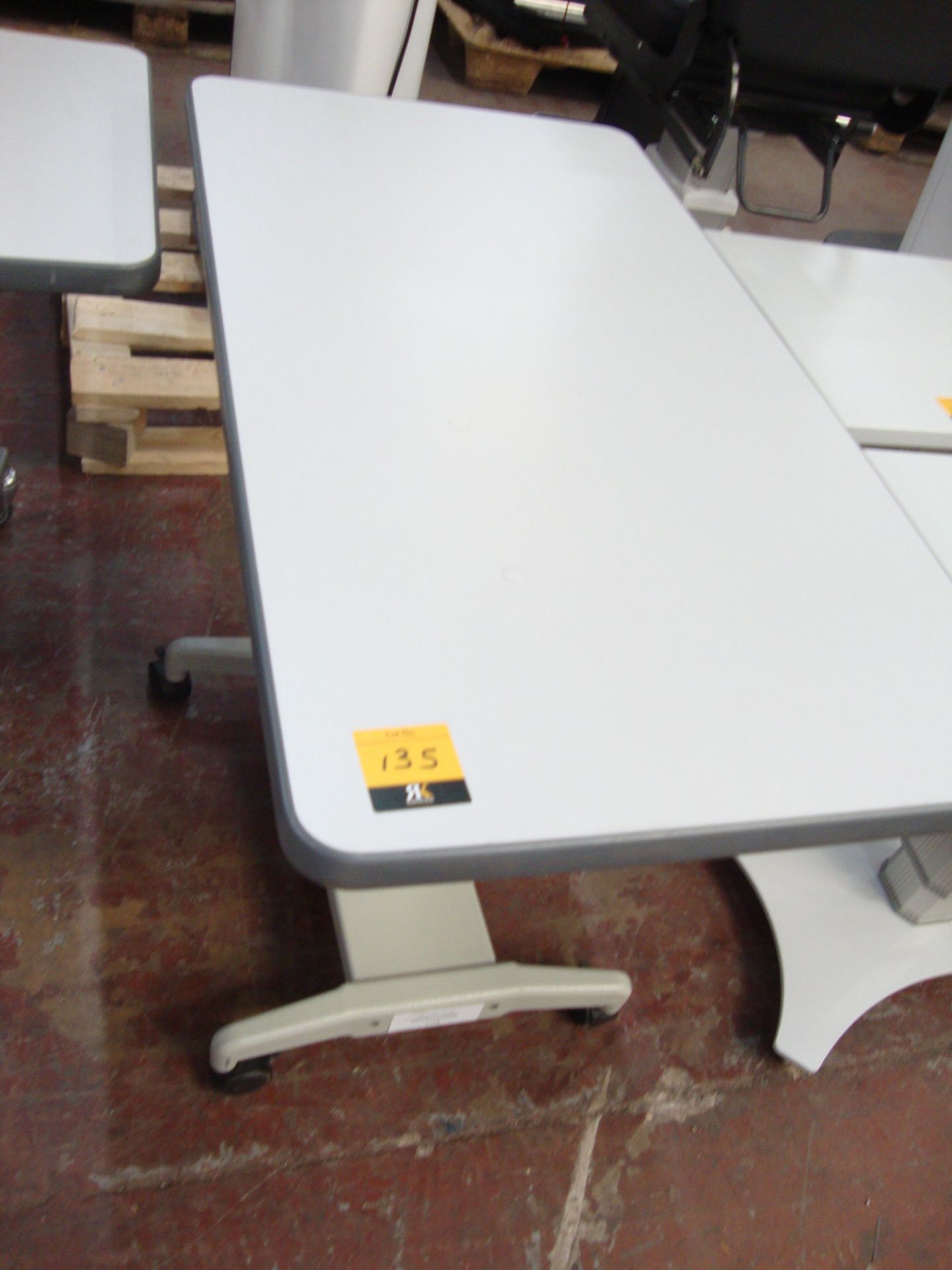 Electric motorized rising table 910mm x 490mm All the lots in this auction are being sold on