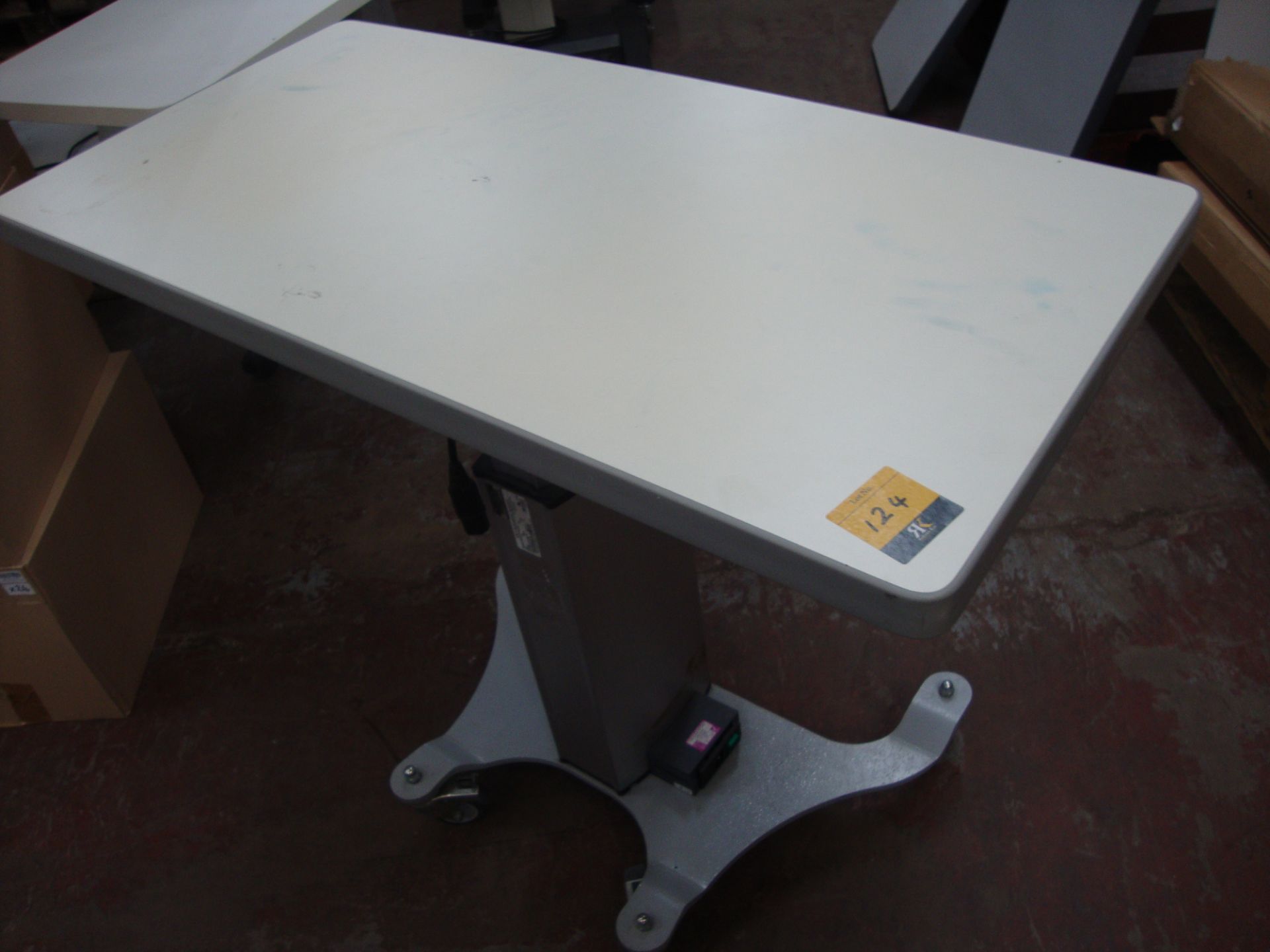 Electric/motorized table 910mm x 490mm All the lots in this auction are being sold on behalf of