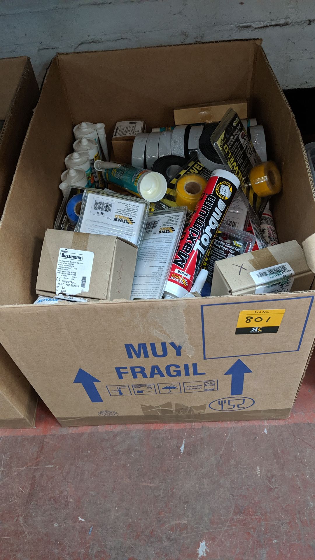 Box of assorted silicone, tape, fixings and more IMPORTANT: Please remember goods successfully bid