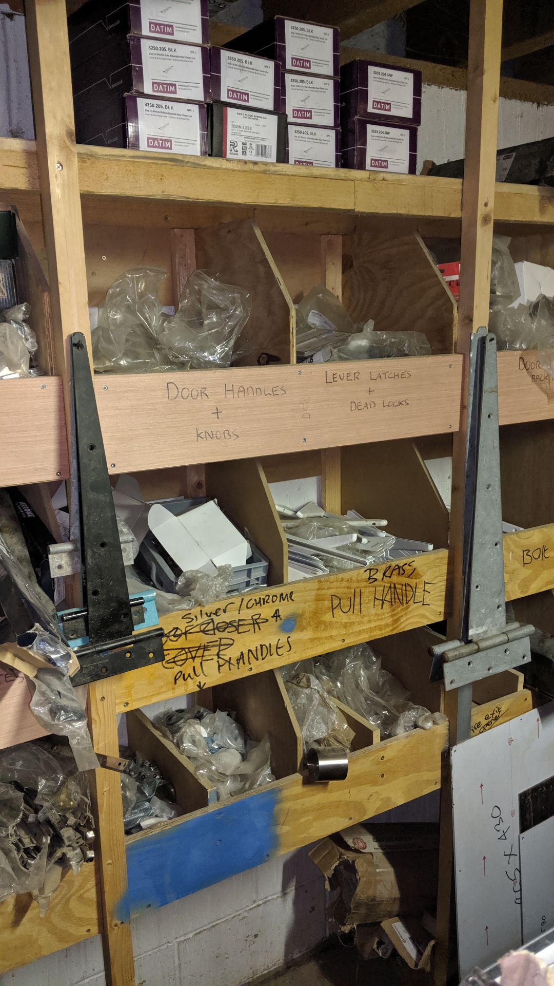 Complete contents of the stockroom including door closers, hinges, handles, fixings, drawer runners, - Image 7 of 29