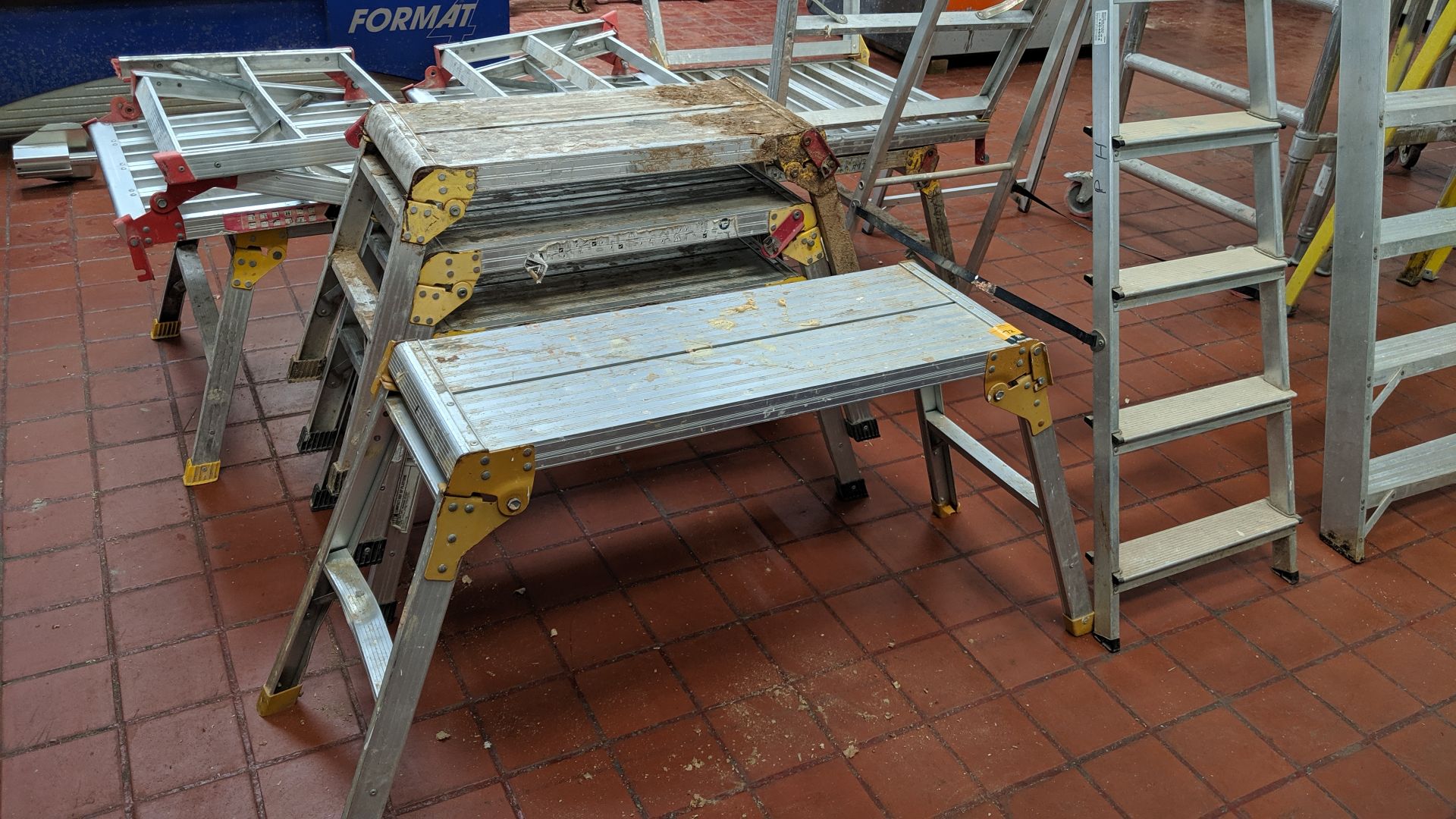 4 assorted folding workmen's platforms/steps IMPORTANT: Please remember goods successfully bid