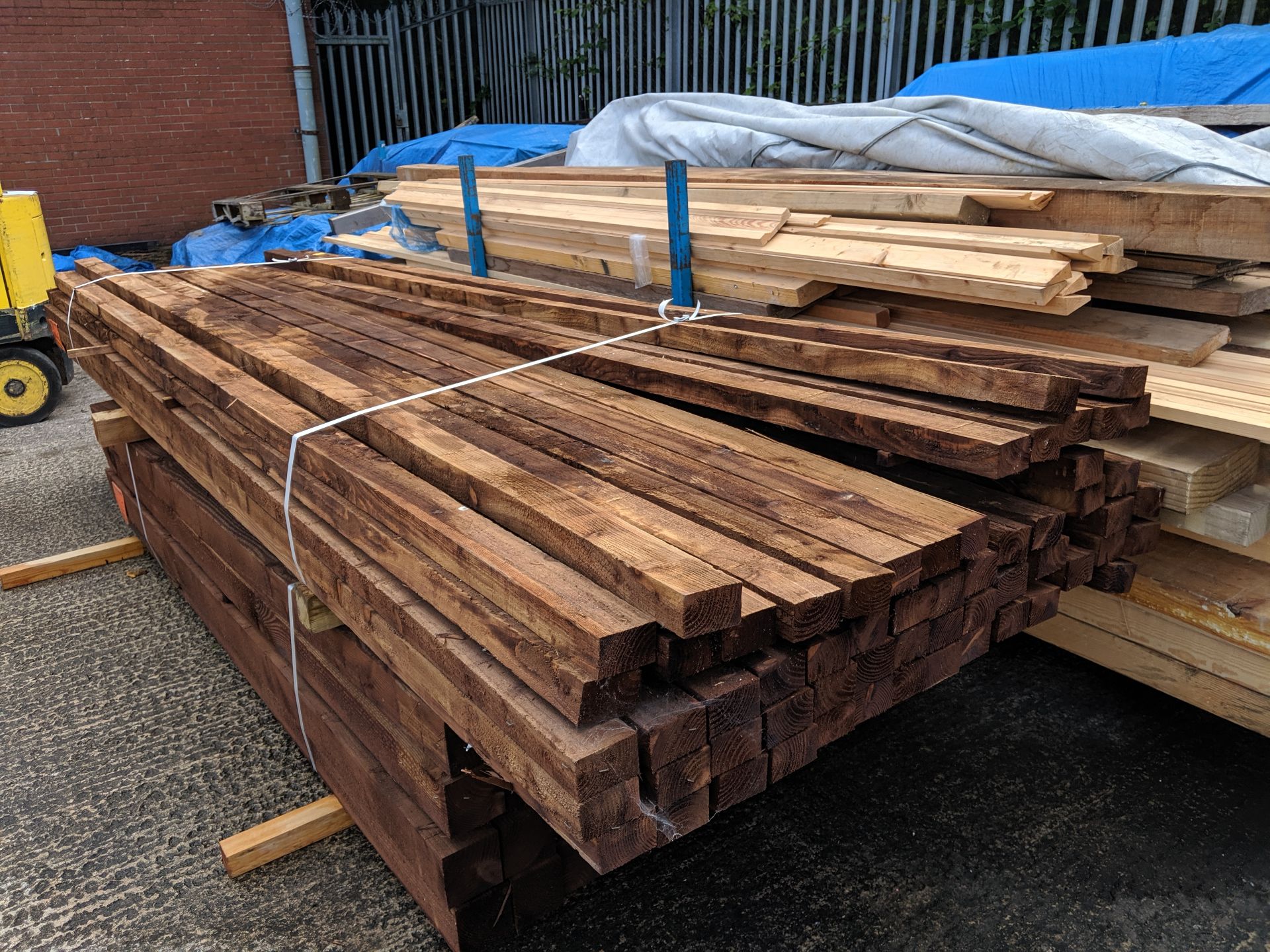 Bundle of approximately 56 brown treated fence posts, indicated on a label as being 3.6 x 75 x 50, - Image 5 of 5