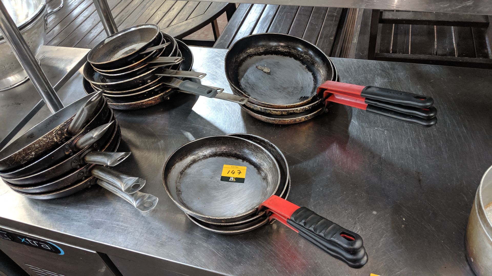 4 stacks of skillets & frying pans - approximately 18 pans in total This is one of a number of