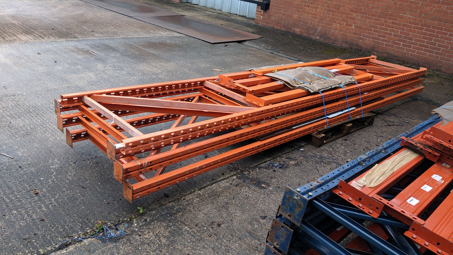 Quantity of pallet racking consisting of 4 orange uprights each measuring approx. 201" x 35", 4