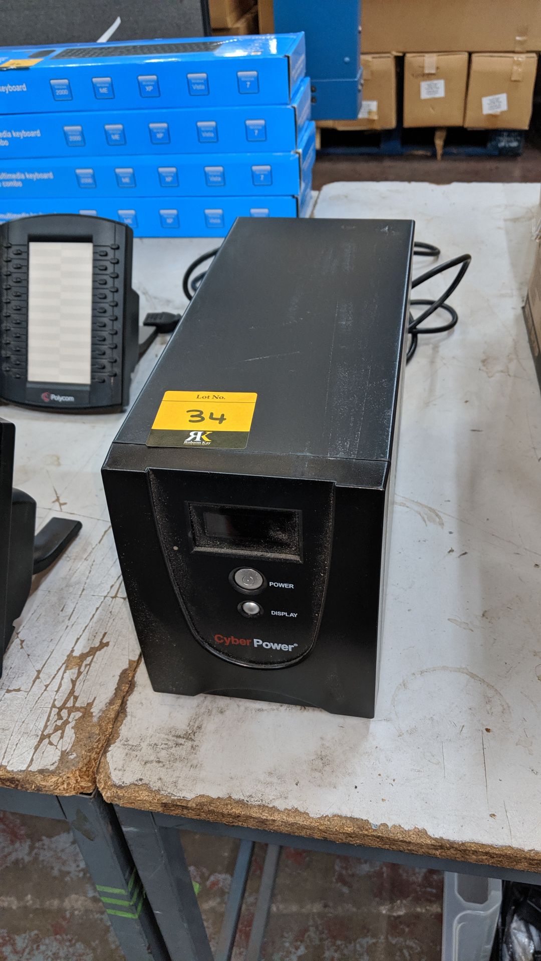 Cyber Power computer battery backup unit model Value 1500EILCD, including 6 power output sockets.