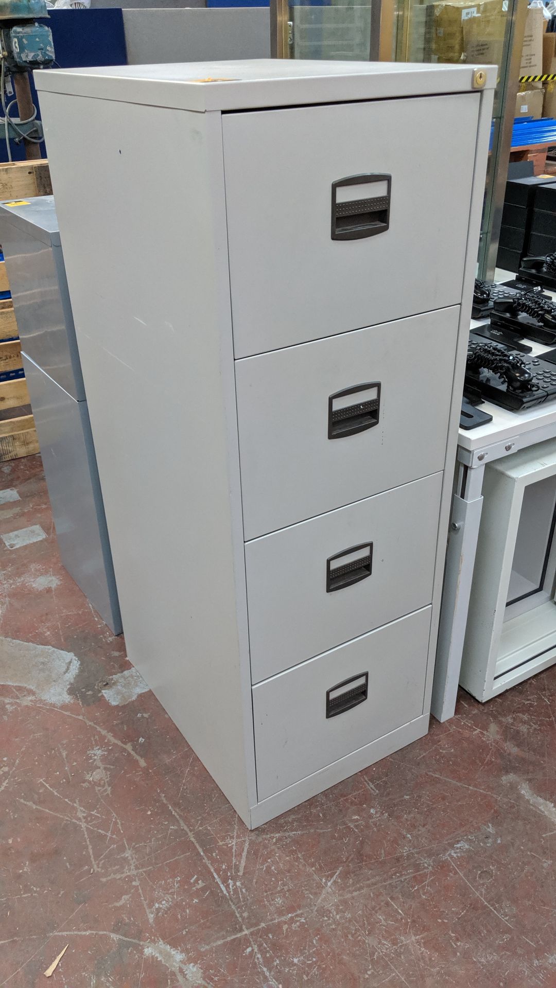 Metal 4-drawer filing cabinet. This is one of a large number of lots being sold on behalf of - Image 2 of 3