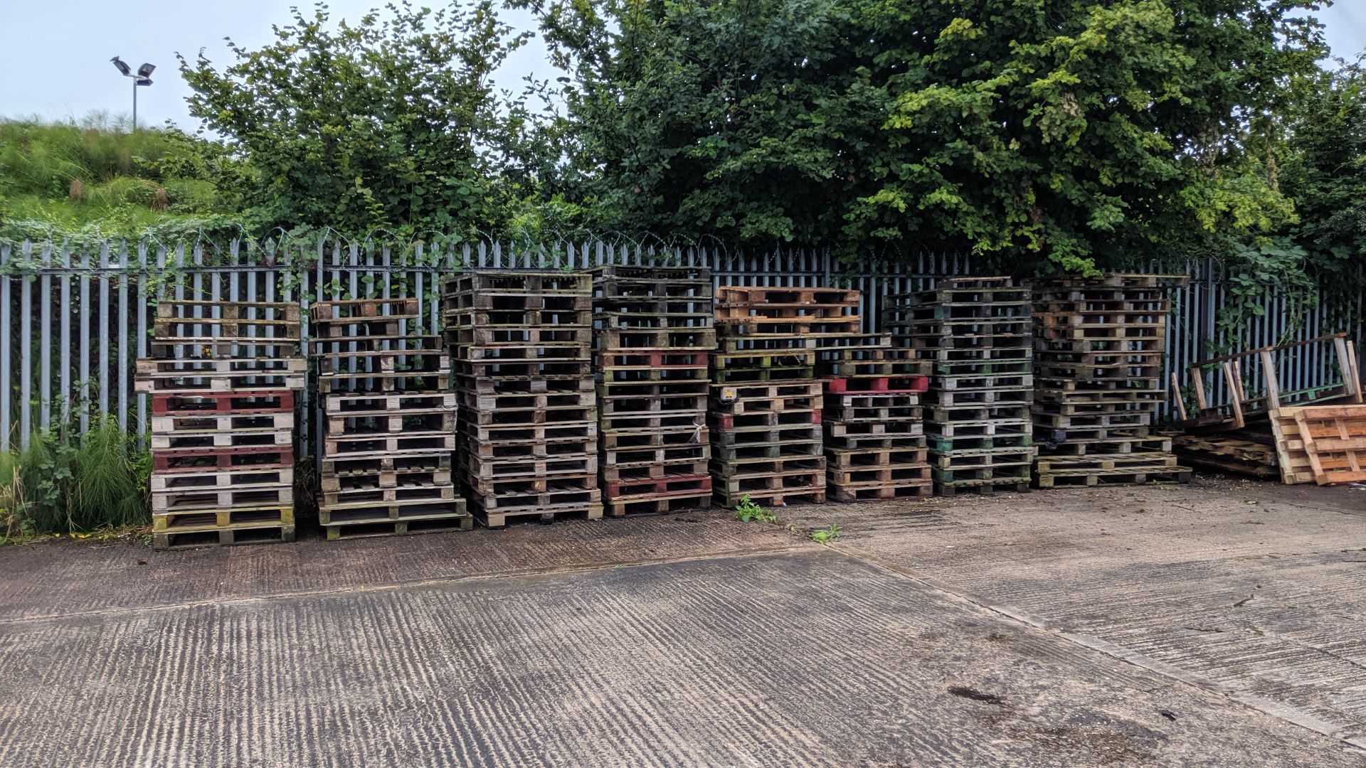 8 stacks of pallets - this lot consists of approx. 110 pallets in total. A strict condition of