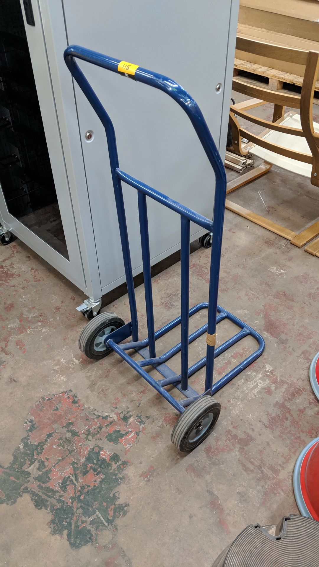Blue metal sack truck with hinged footplate. This is one of a large number of lots being sold on