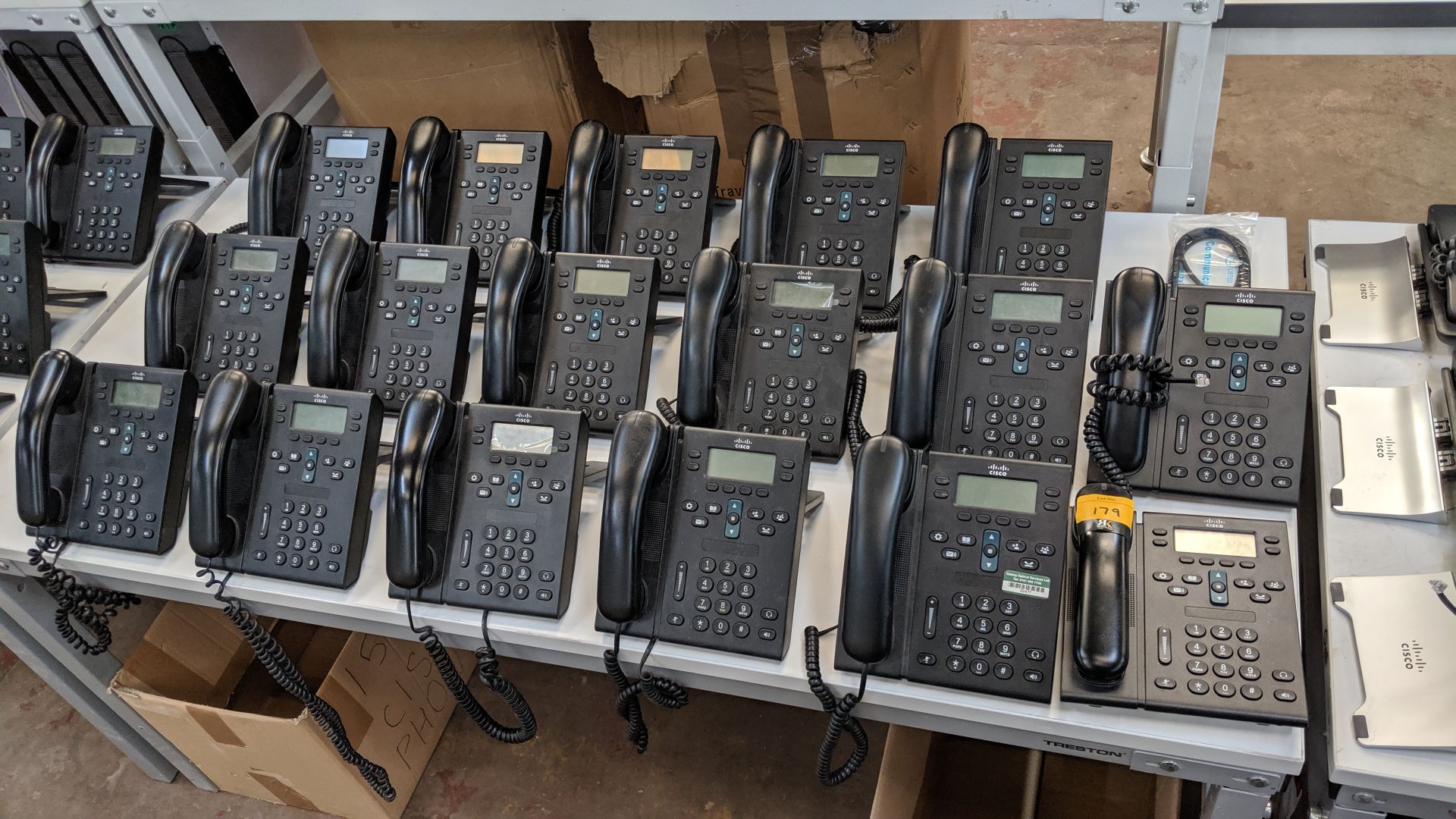 17 off Cisco model CP-6941 telephone handsets (16 of the handsets include a desk stand & one does