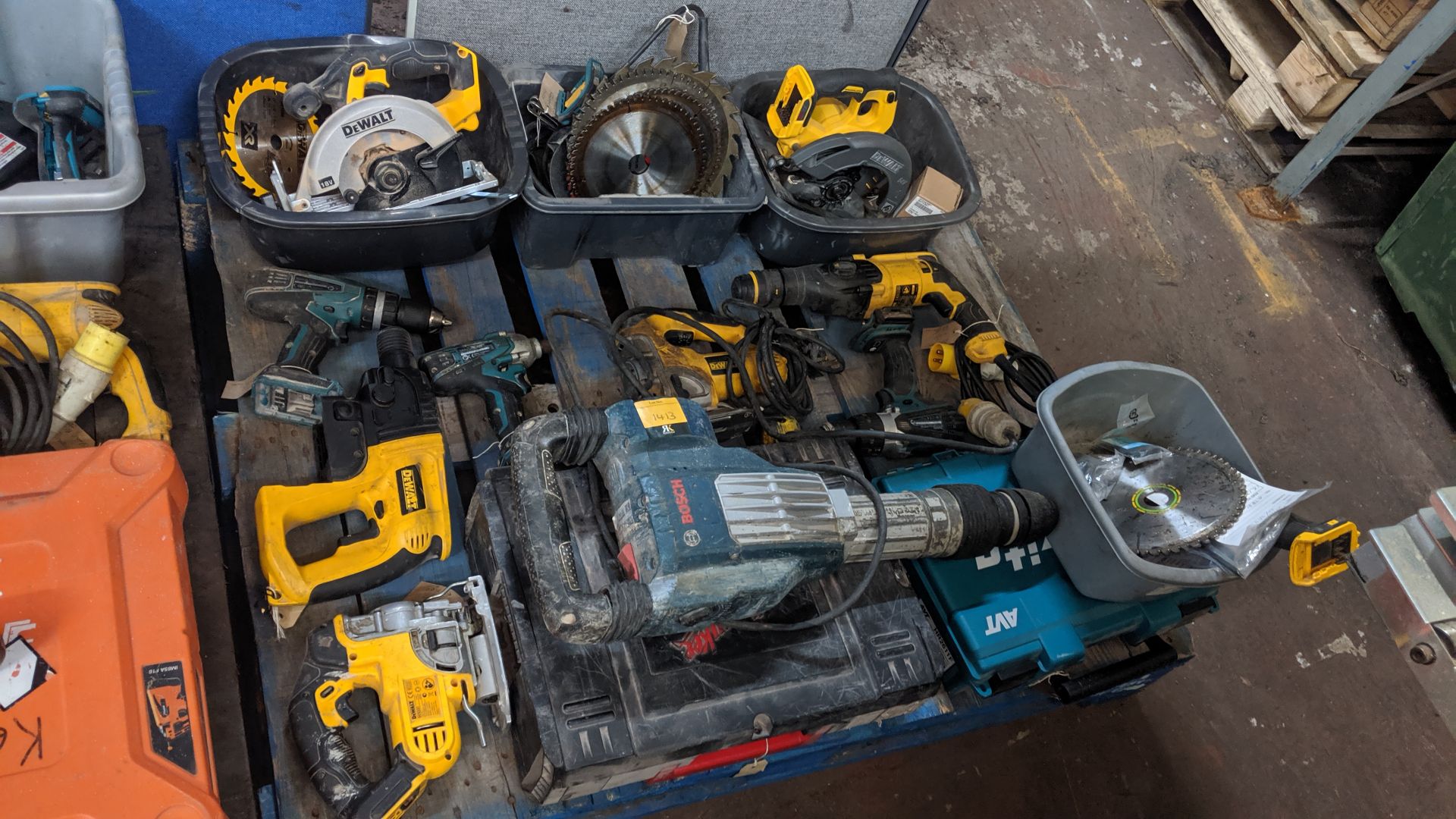 Contents of a pallet of assorted power tools. This is one of a number of lots that relate to a power