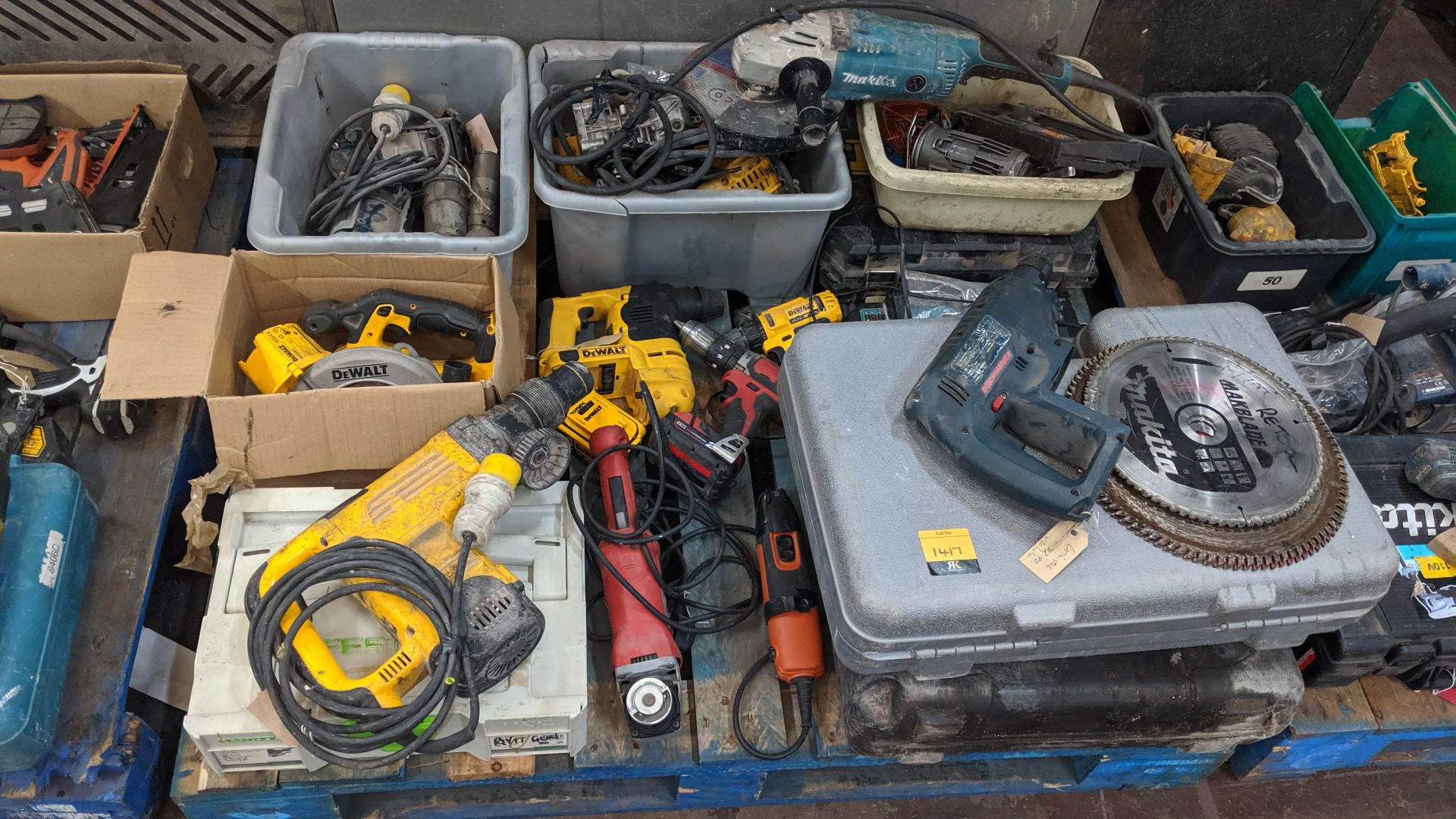 Contents of a pallet of assorted power tools. This is one of a number of lots that relate to a power