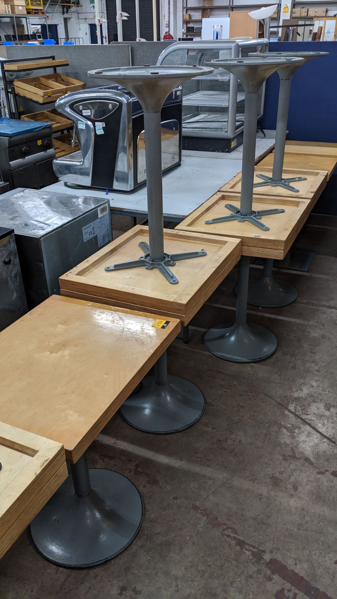 7 off rectangular cafï¿½ tables, each top measuring 65 x 53cm on single pedestal metal base. NB.