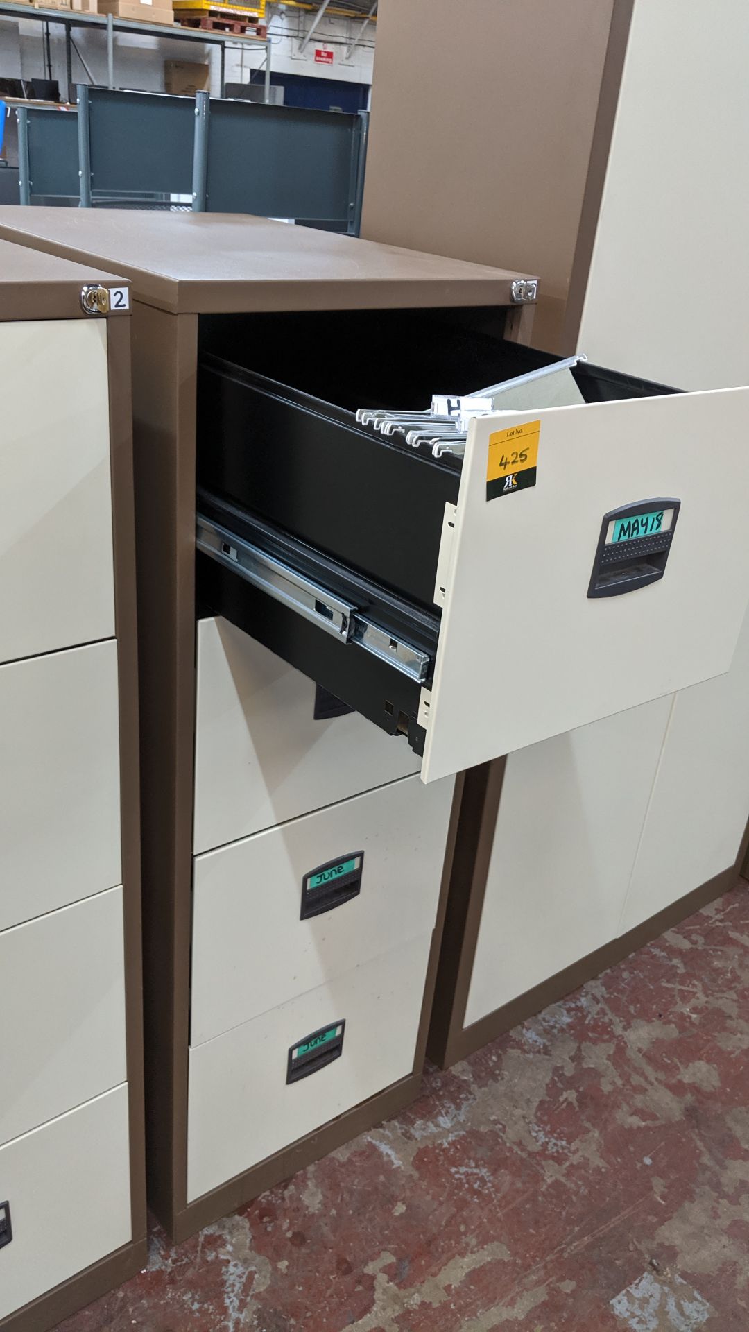 Brown metal 4-drawer filing cabinet with key. This is one of a large number of lots used/owned by - Image 3 of 4