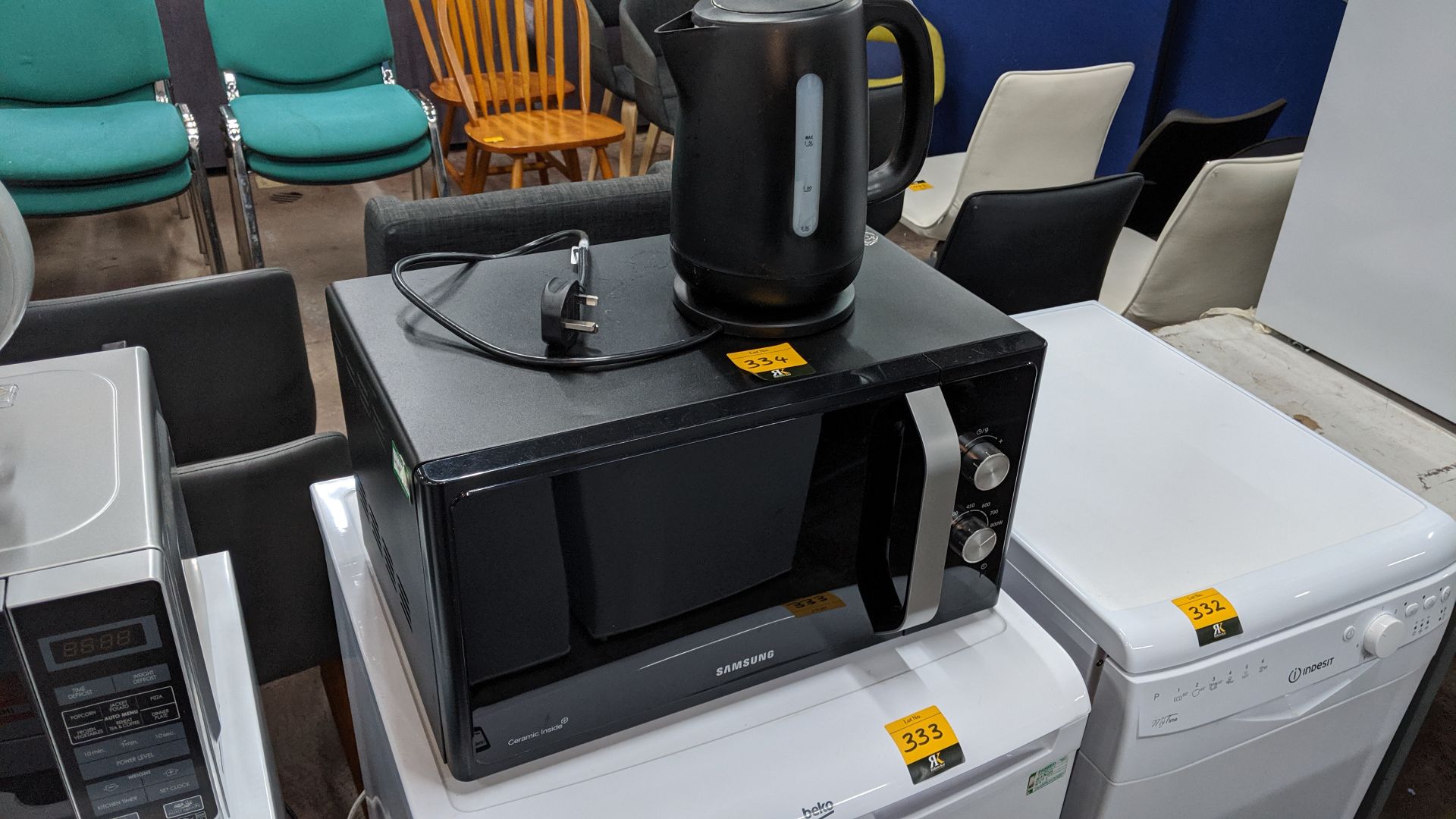 Samsung microwave with ceramic interior plus cordless kettle, both finished in black. This is one of