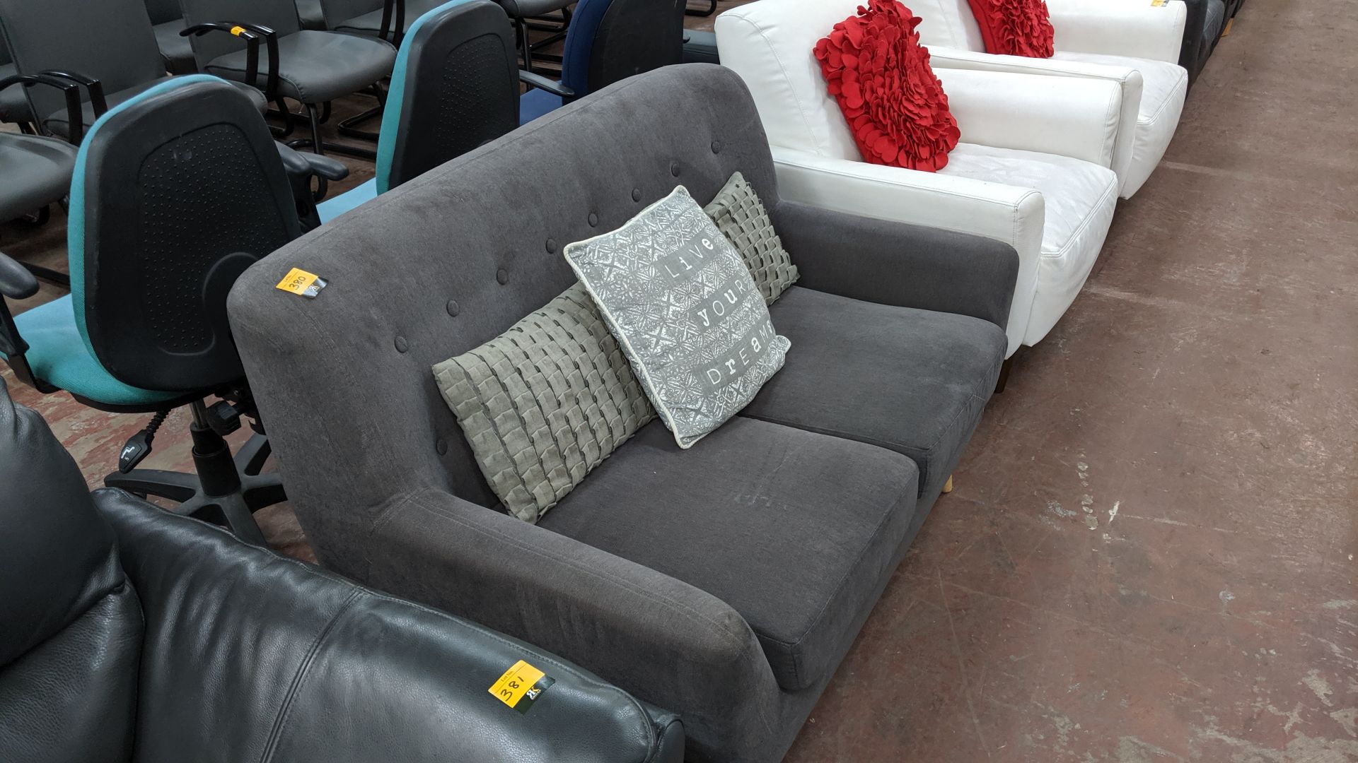 Grey sofa on wooden legs with 3 assorted cushions. This is one of a large number of lots used/ - Image 3 of 5