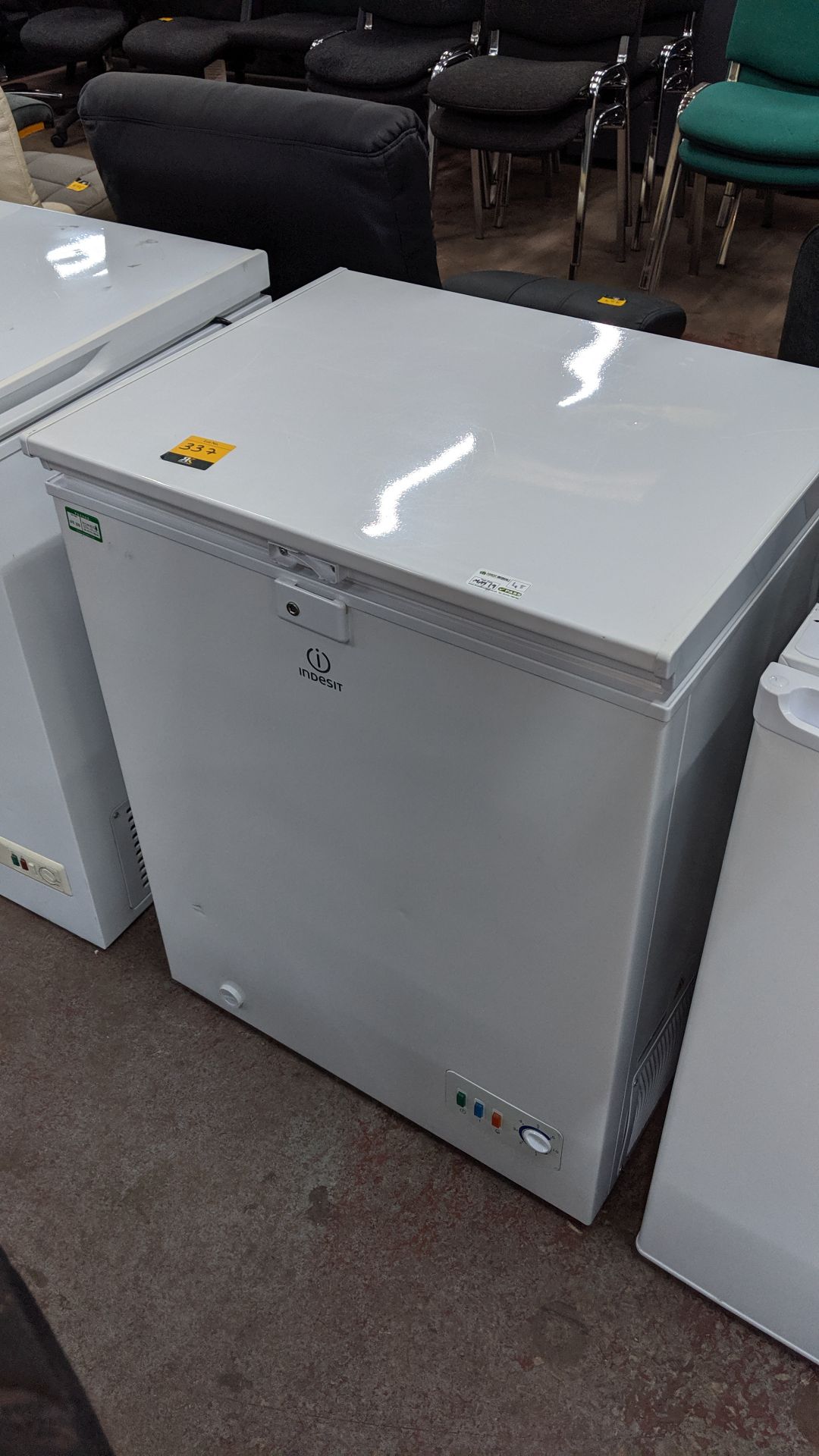 Indesit compact lockable chest freezer, model OF1A100, NB no key. This is one of a large number of