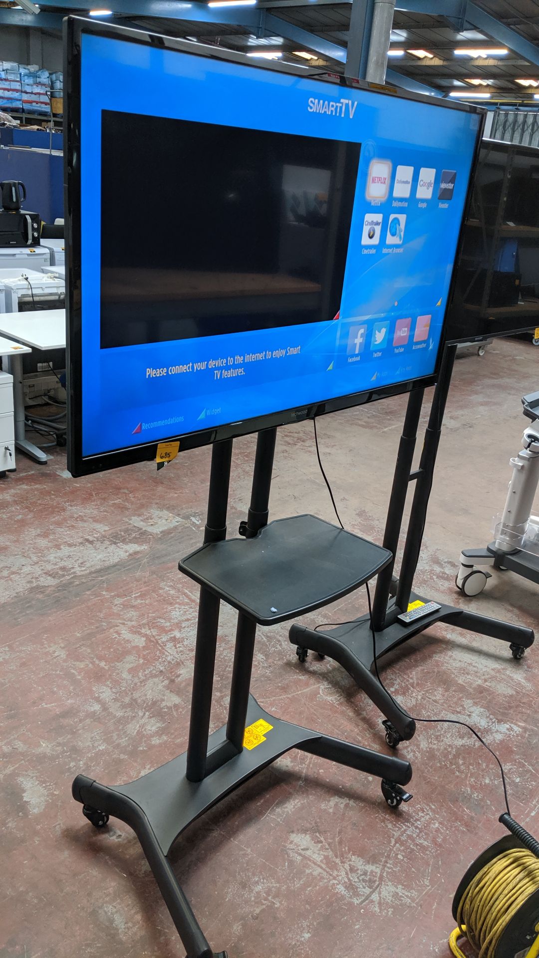 Techwood 49" widescreen LCD TV on mobile stand including shelf & remote control. This is one of a - Image 2 of 11