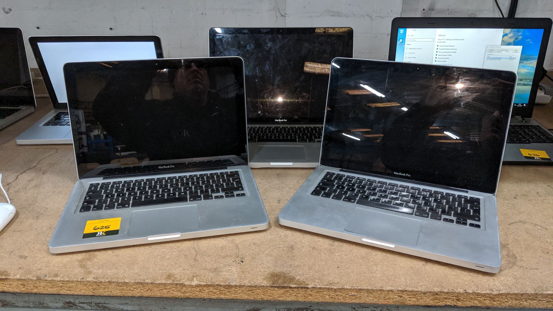 3 off Apple MacBook Pro silver notebook computers, no power packs/chargers, we have been unable to