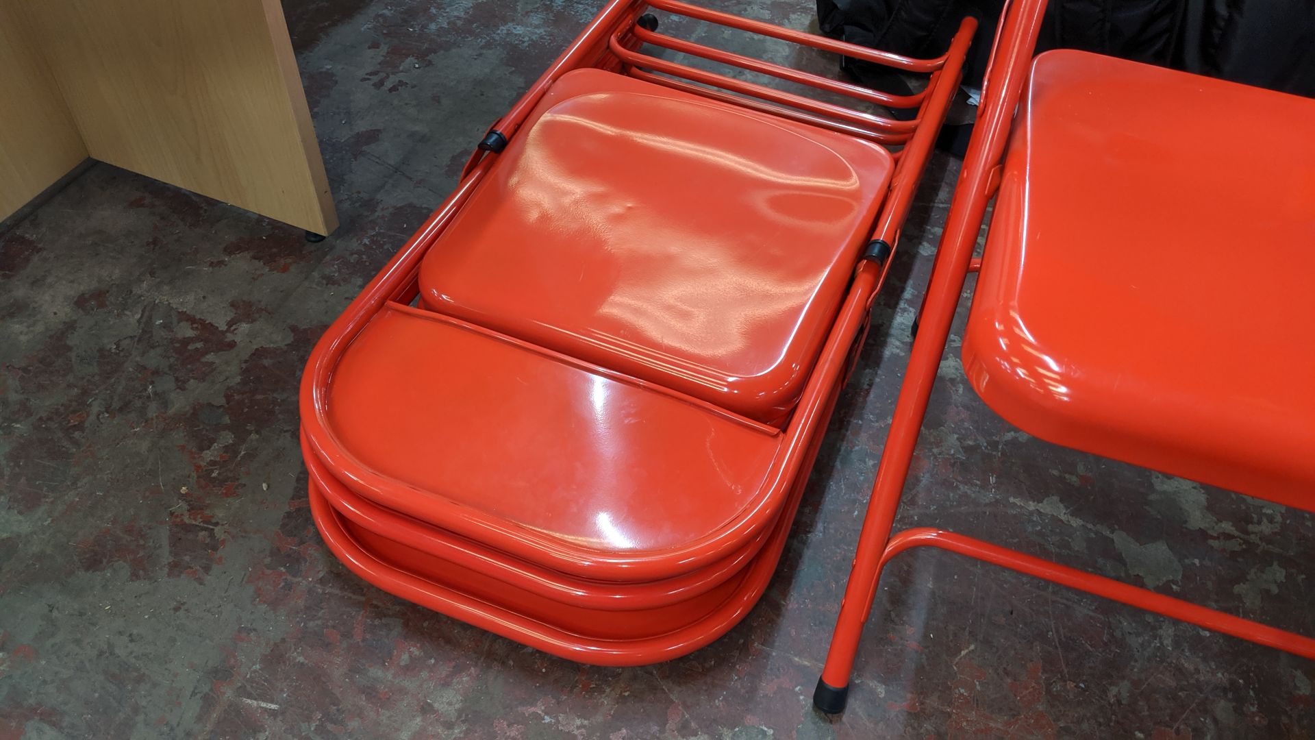 4 off red metal folding matching chairs. This is one of a large number of lots used/owned by One - Image 4 of 4