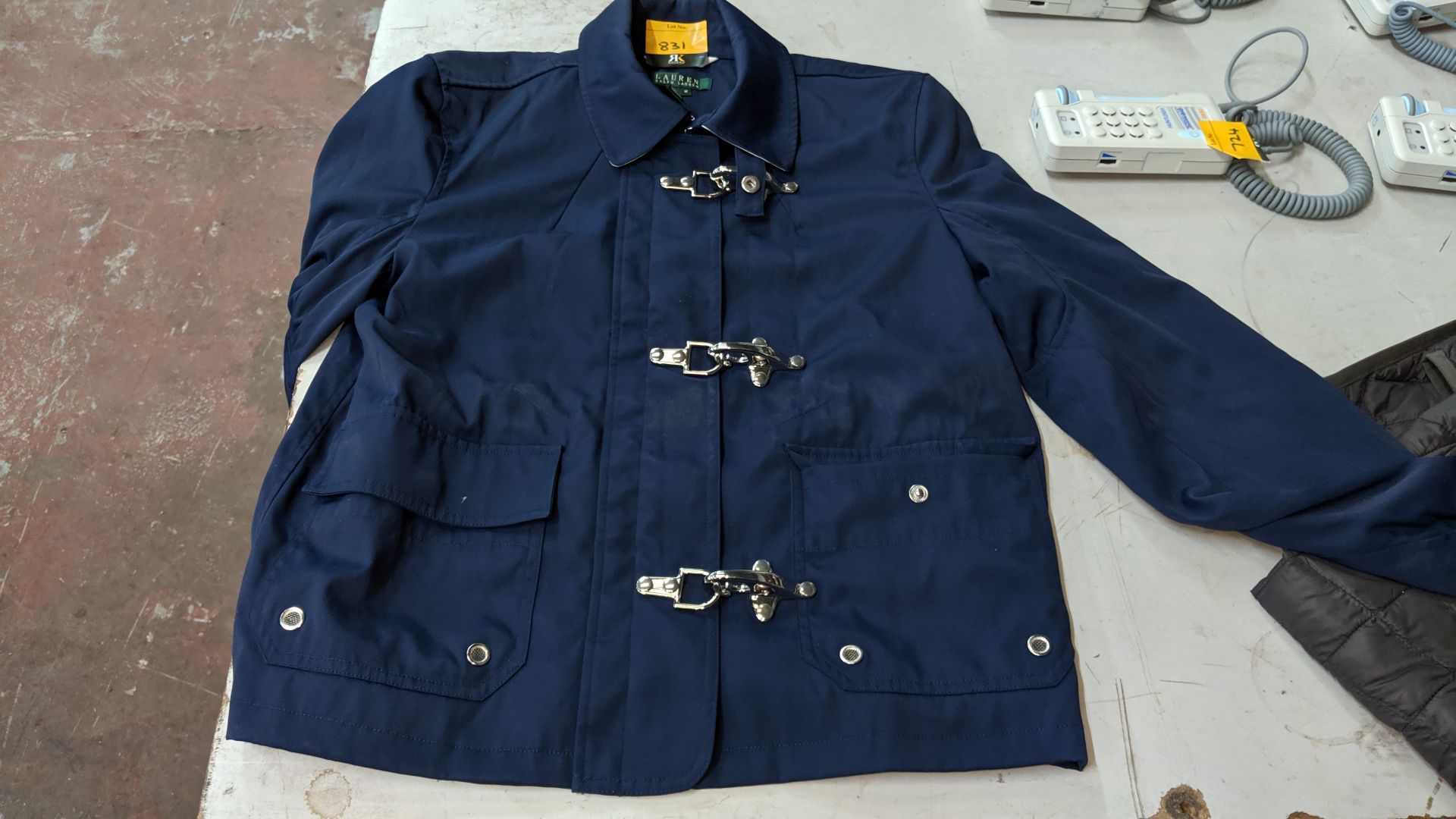 Ralph Lauren navy jacket with heavy-duty buckles, assumed to be ladies, size medium. IMPORTANT: