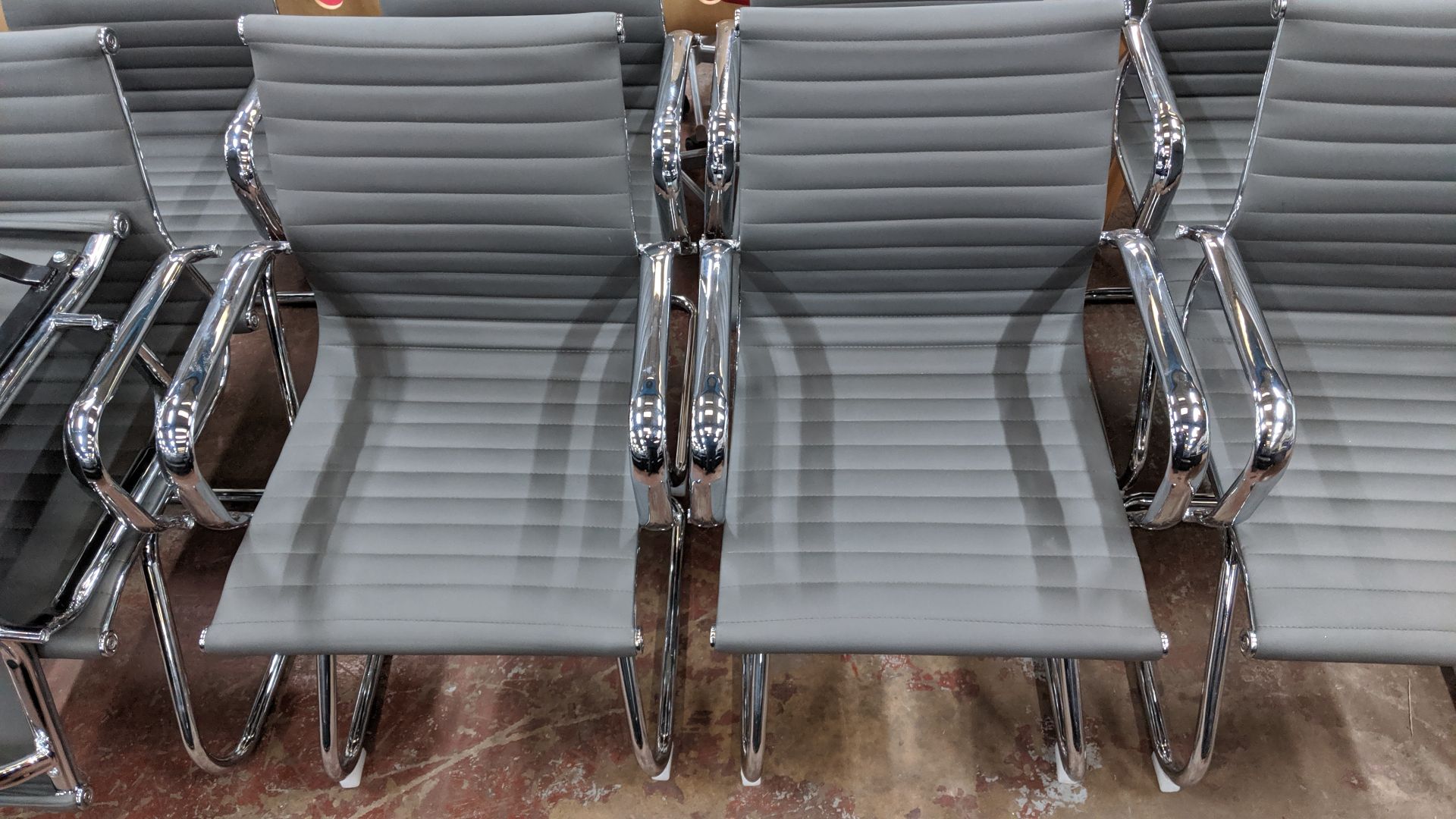 9 off matching chrome cantilever framed chairs with grey ribbed fabric upholstery. This is one of - Image 6 of 7