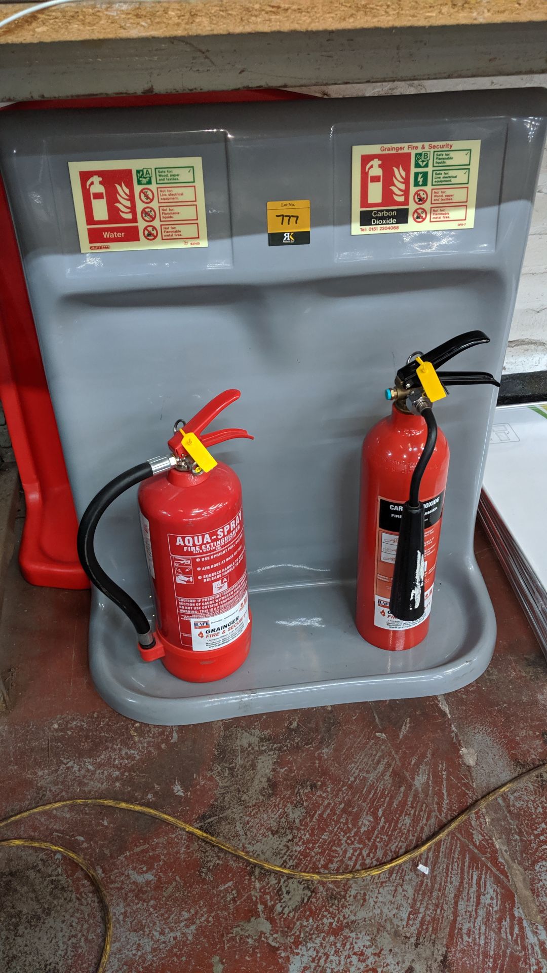 2 off fire extinguisher plastic bays/stands plus 2 off fire extinguishers. This is one of a large