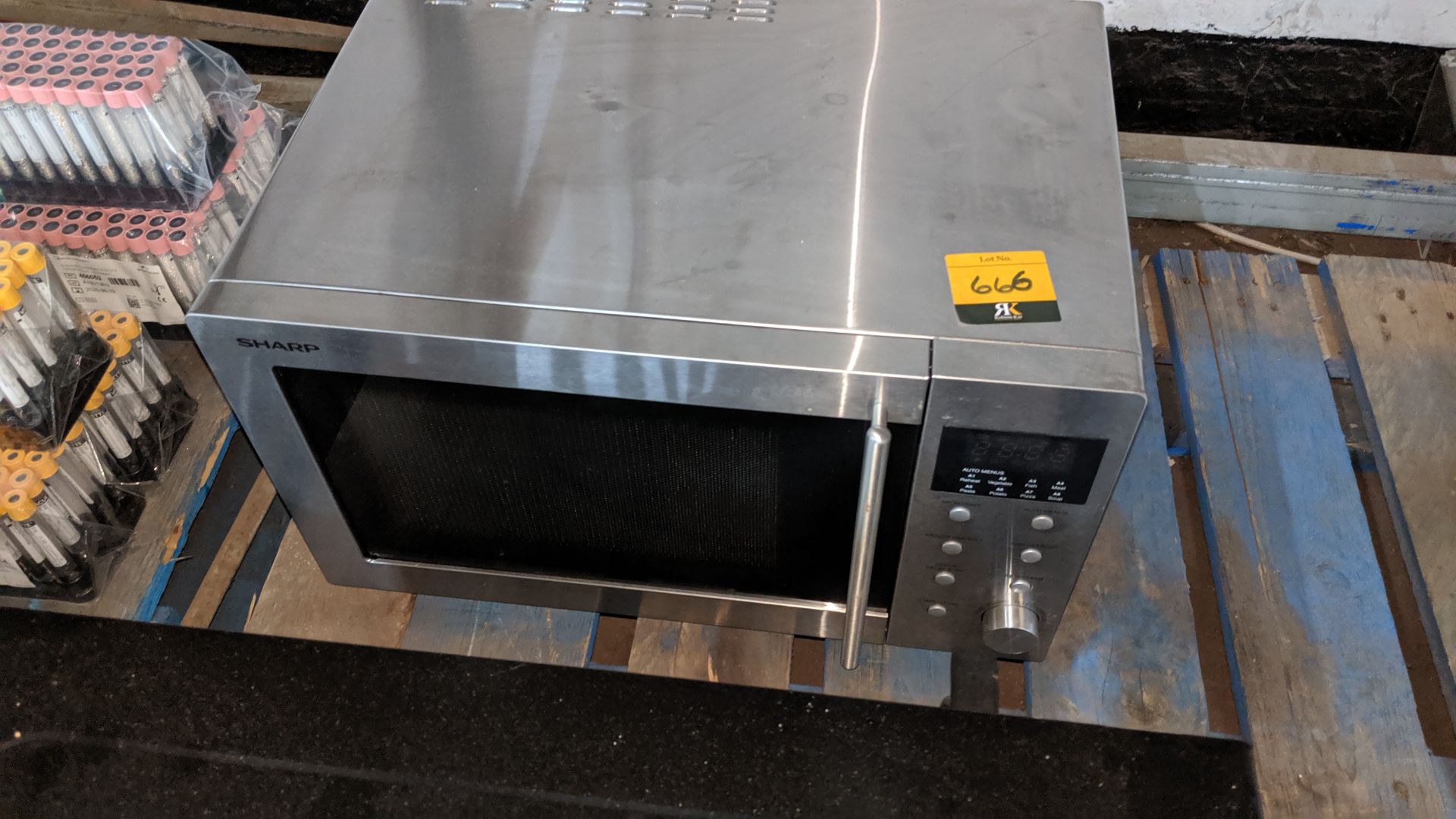 Sharp stainless steel microwave. This is one of a large number of lots used/owned by One To One (