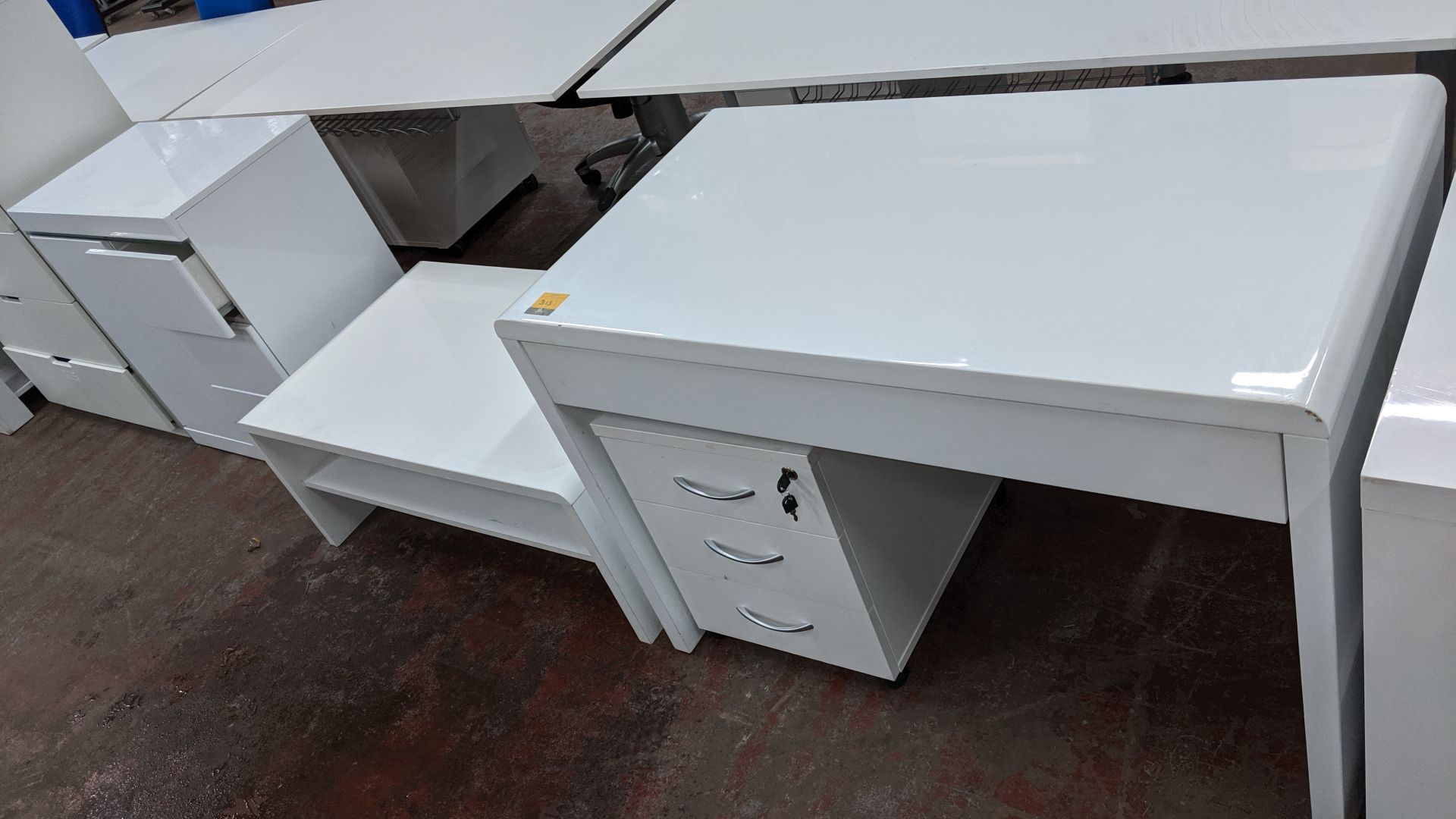 3 pieces of white gloss finish furniture comprising small desk, occasional table, storage unit &