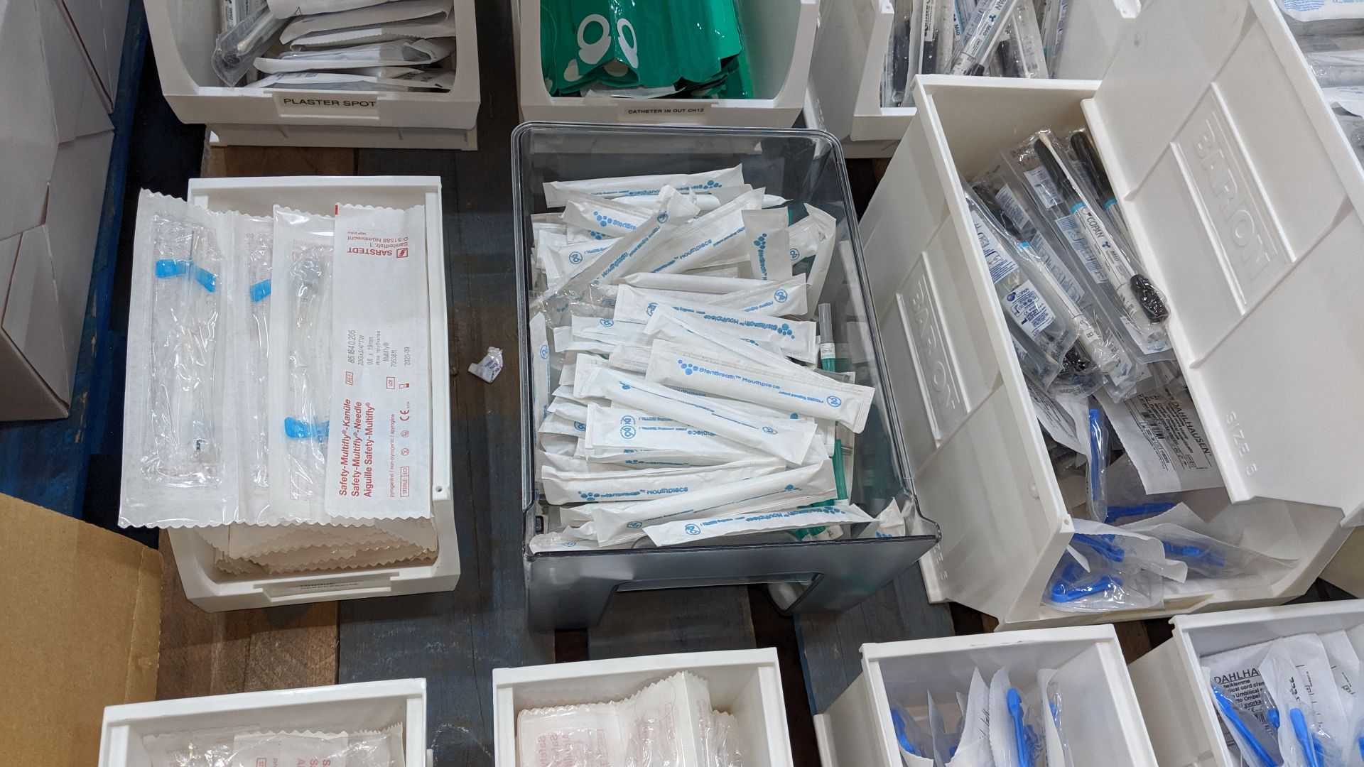 Contents of a pallet of medical supplies consisting of a large quantity of plastic bins & their - Image 4 of 11