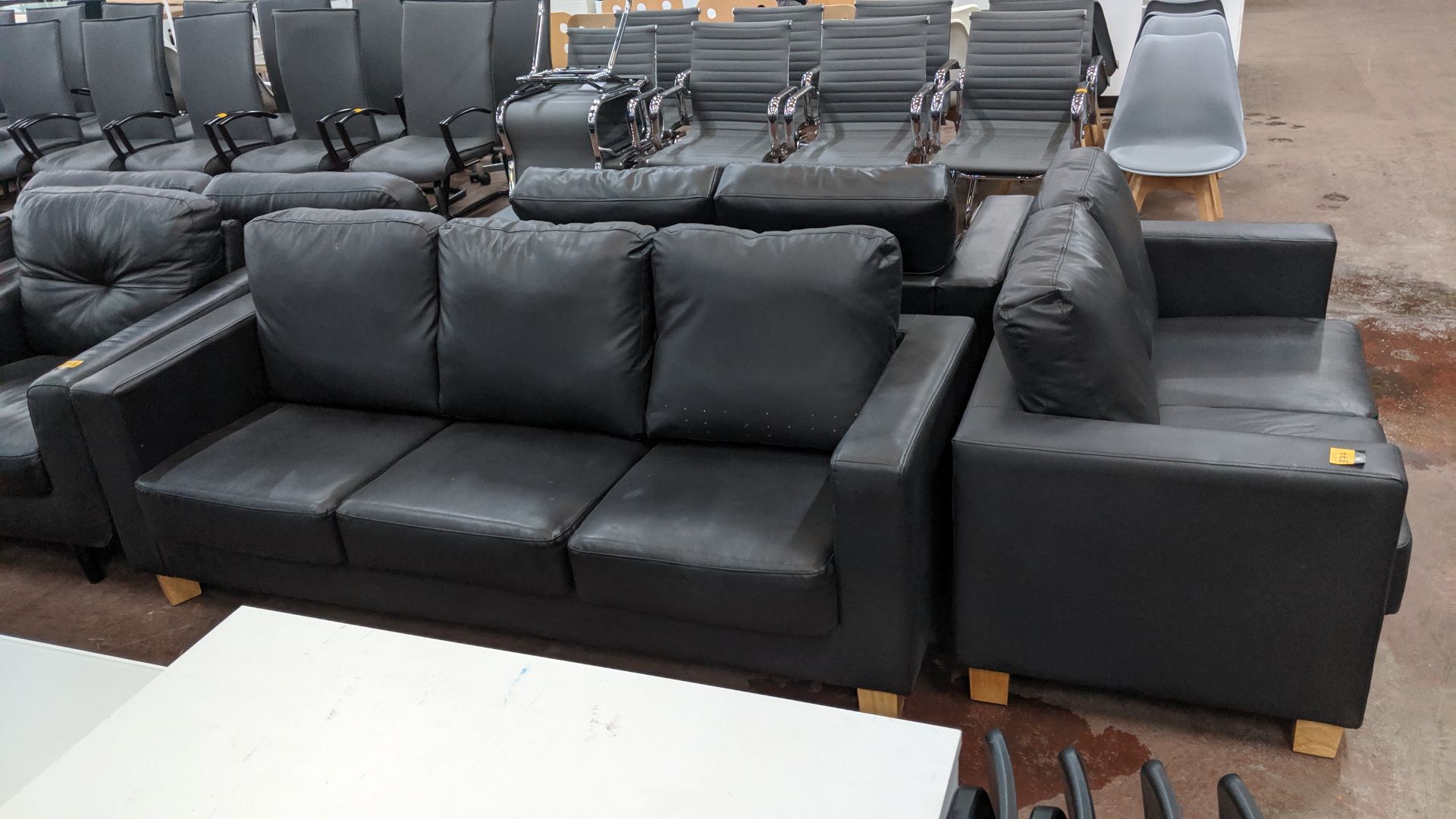 Pair of black leather-look sofas, comprising 1 off 2-seater & 1 off 3-seater. This is one of a large - Image 6 of 6