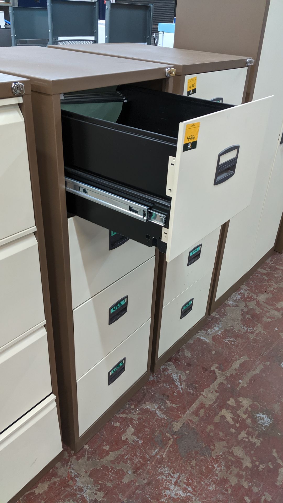 Brown metal 4-drawer filing cabinet with key. This is one of a large number of lots used/owned by - Image 3 of 4