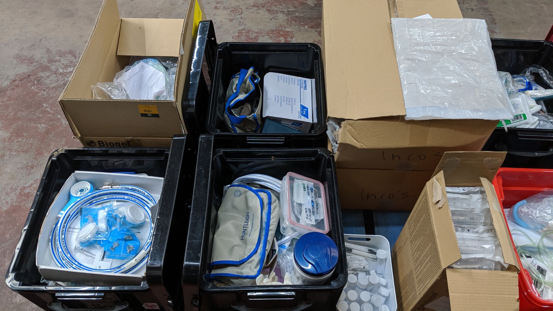 Contents of a pallet of assorted medical supplies including single use resuscitators, Analgesic
