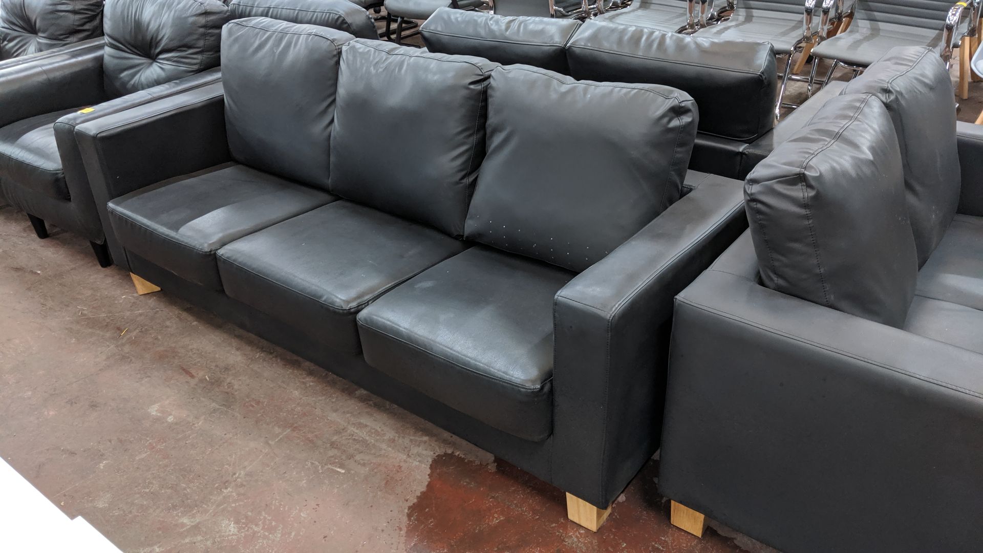 Pair of black leather-look sofas, comprising 1 off 2-seater & 1 off 3-seater. This is one of a large - Image 4 of 6