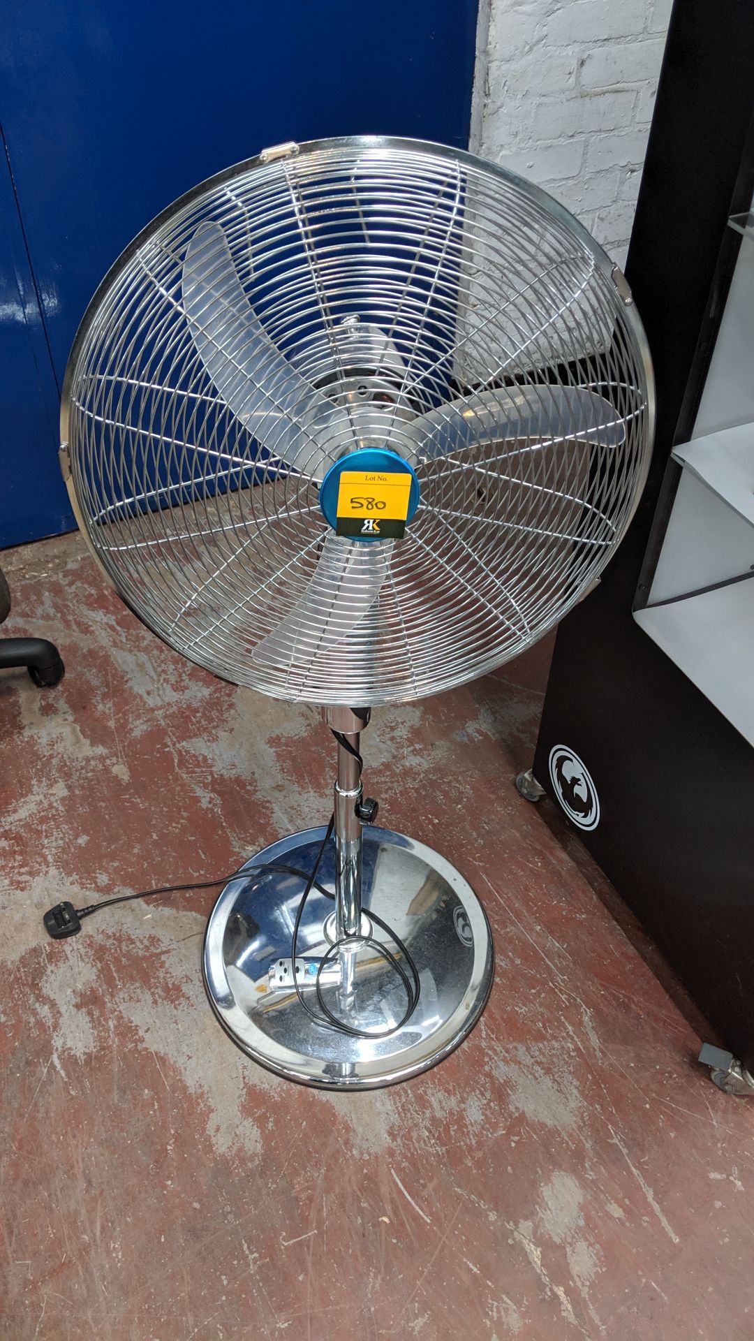 Chrome finish floor standing pedestal fan with remote control. Lots 560 - 580 form the total