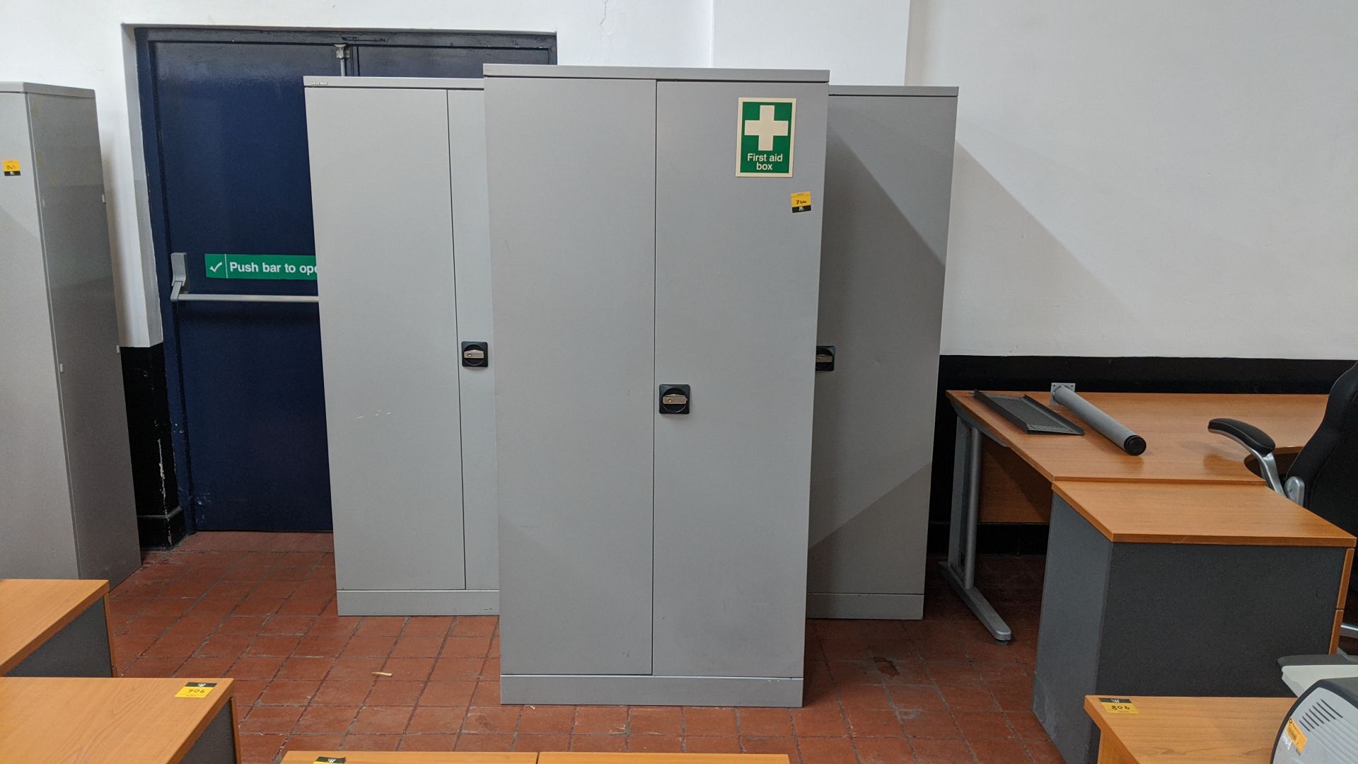 3 off grey metal tall stationery cupboards. This is one of a large number of lots in this sale being