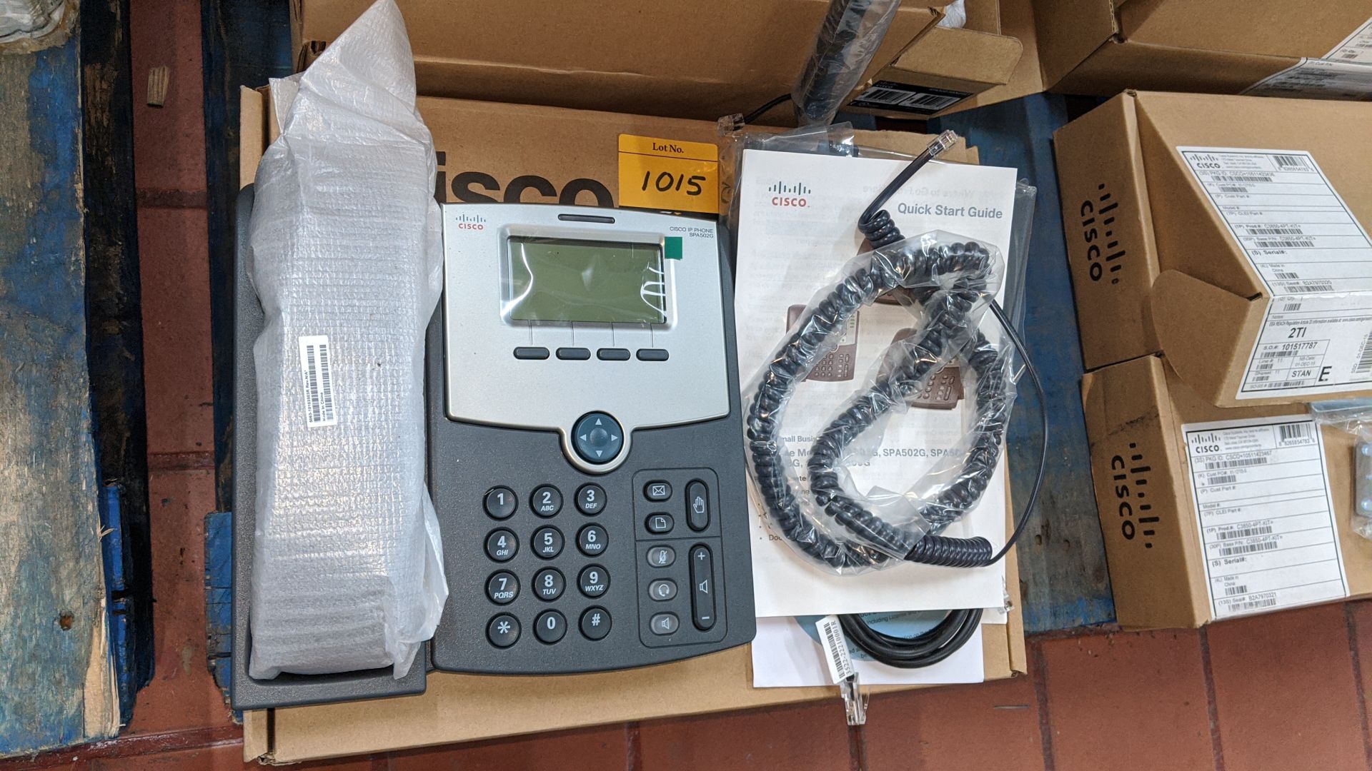 Cisco IP phone model SPA502G. This is one of a large number of lots in this sale being sold for