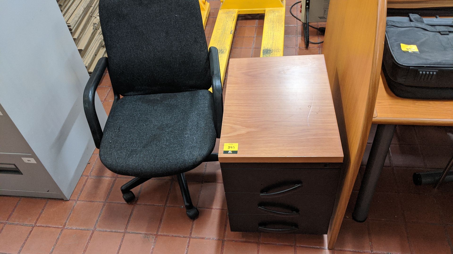 Mobile desk pedestal plus 1 off office chair with arms. This is one of a large number of lots in