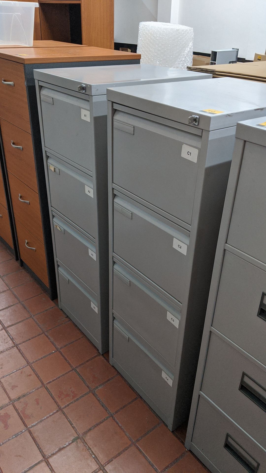 2 off matching pale grey metal 4-drawer filing cabinets with keys. This is one of a large number