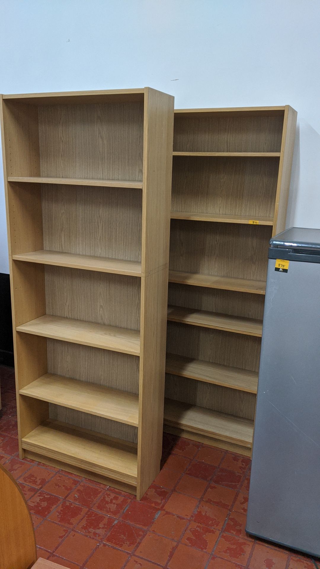 2 off tall wooden open front bookcases. This is one of a large number of lots in this sale being