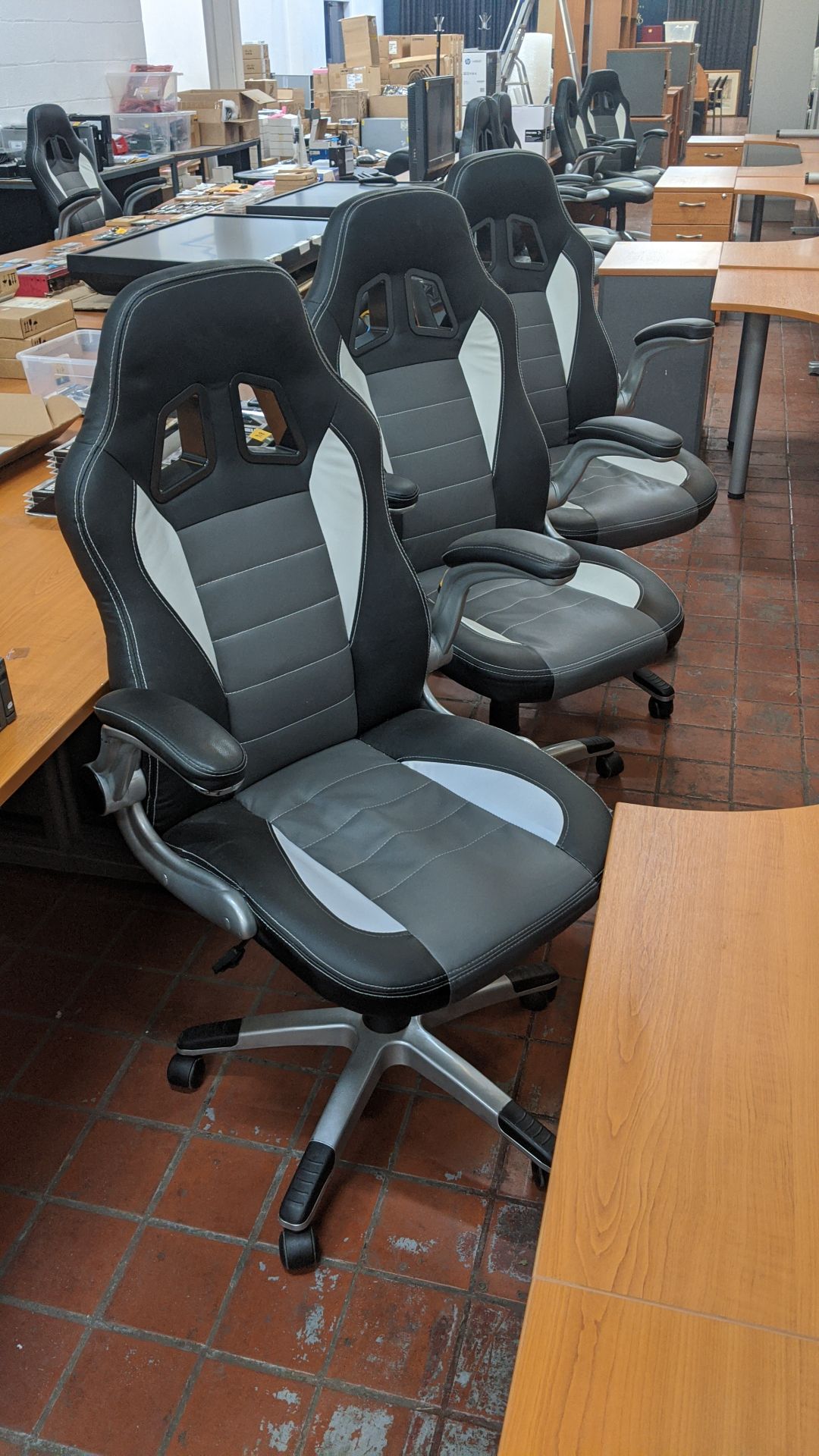 3 off motorsports style black & silver leather exec chairs. This is one of a large number of lots in