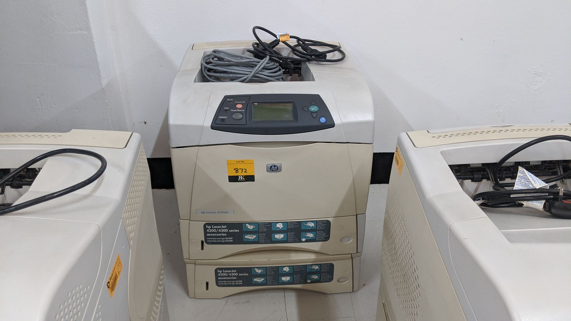 HP LaserJet 4200DTN printer including a total of 2 paper cassettes. This is one of a large number of